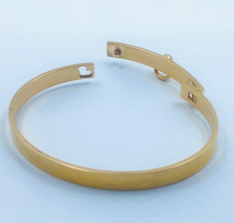 Hermes 18K Gold Bangle Bracelet For Sale at 1stDibs