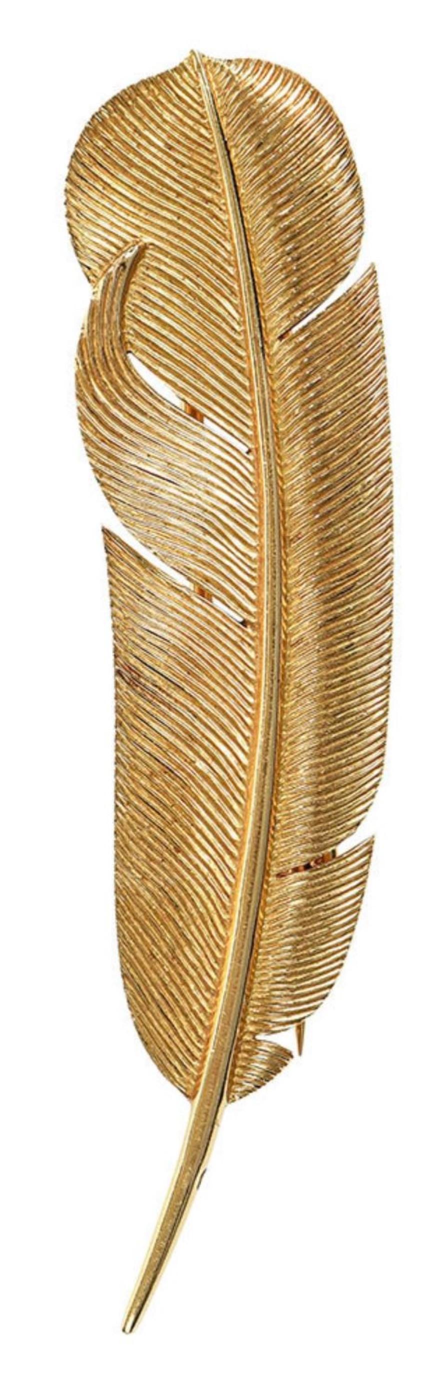A vintage elegance and classy easy to wear vintage feather design brooch by Hermes. Crafted in 18K yellow gold. Signed Hermes Paris, 49662. stamped Depose, SSM. Eagle head hall mark.

Measured 2.63