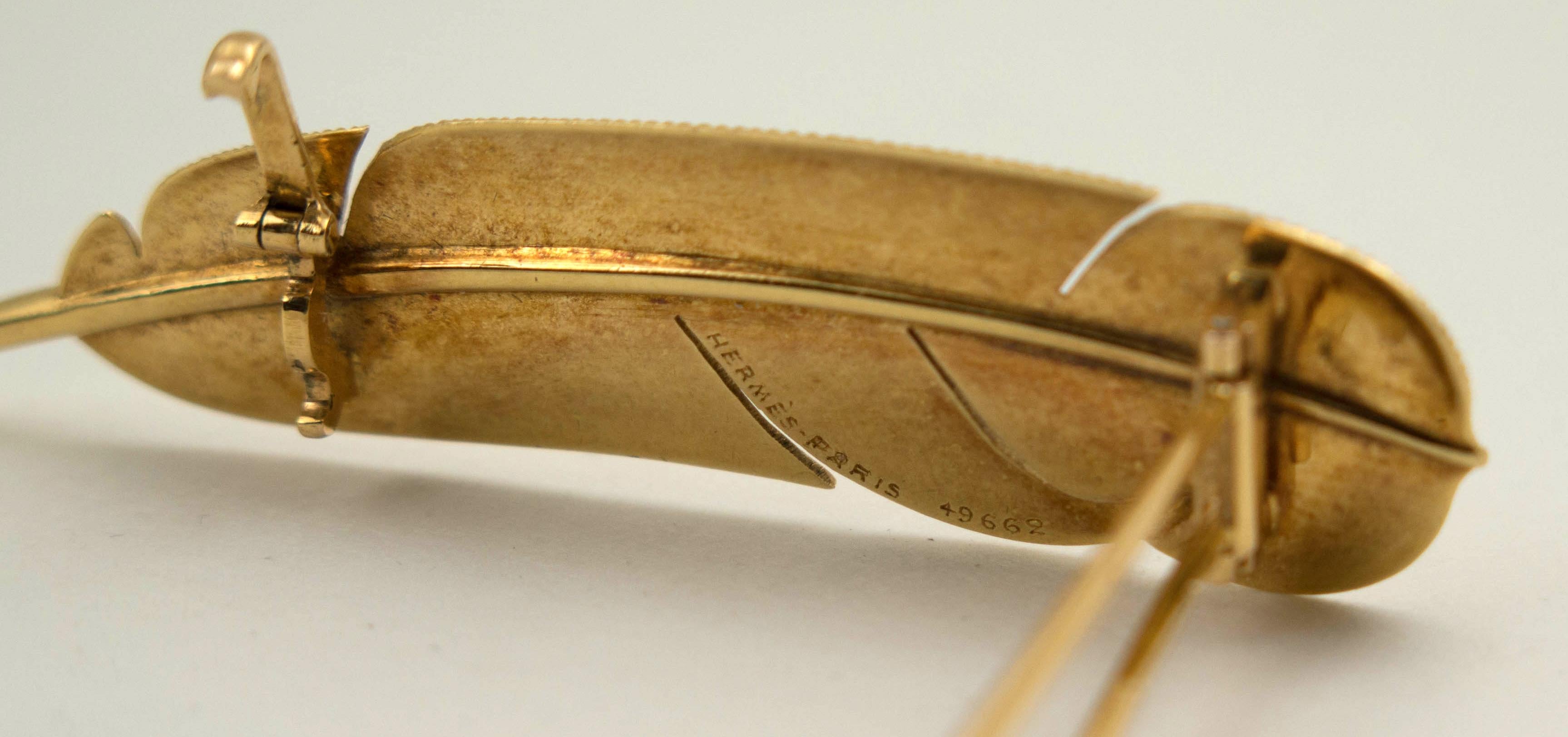 hermes brooch