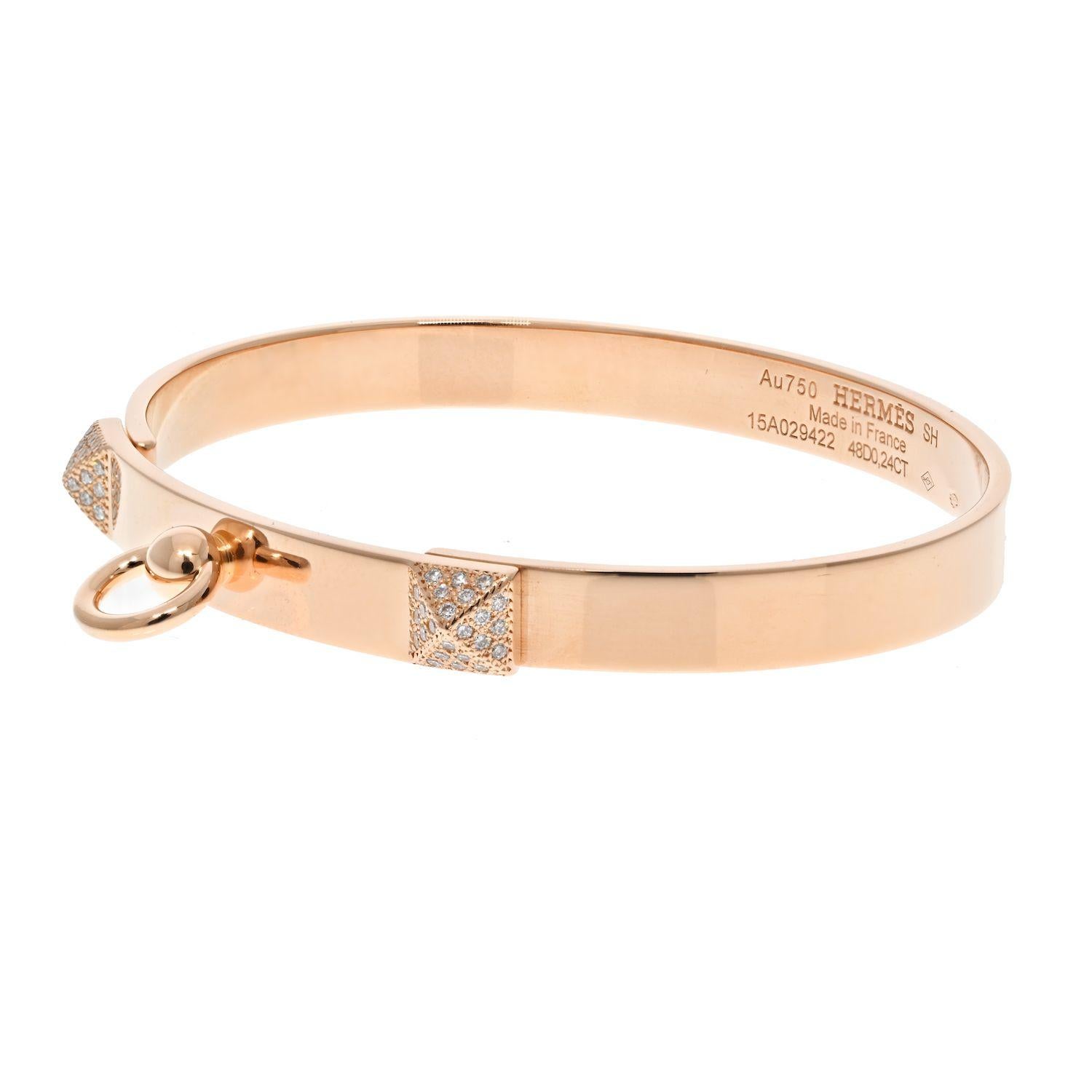 This is a perfect gifting item an 18K Rose Gold diamond bangle bracelet by Hermes. 
From PM Collier De Chien collection you will love the way it looks and feels on the wrist. High polish adds a French chic to your wrist while a touch of diamonds add
