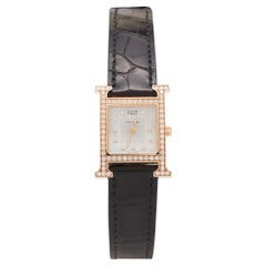 Hermès Montre-bracelet Heure en cuir d'alligator or rose 18K et diamants 21 mm