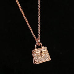 Hermès 18K Rose Gold Diamond Kelly Amulette Pendant Necklace