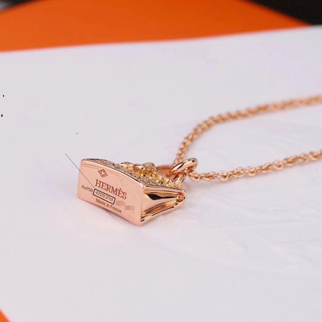 Hermès 18K Rose Gold Diamond Kelly Amulette Pendant Necklace In Excellent Condition In Banbury, GB