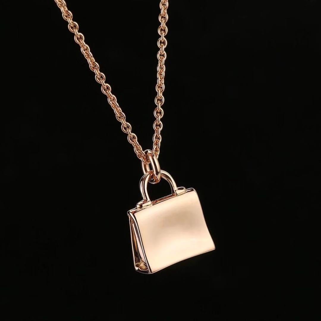 Women's Hermès 18K Rose Gold Diamond Kelly Amulette Pendant Necklace