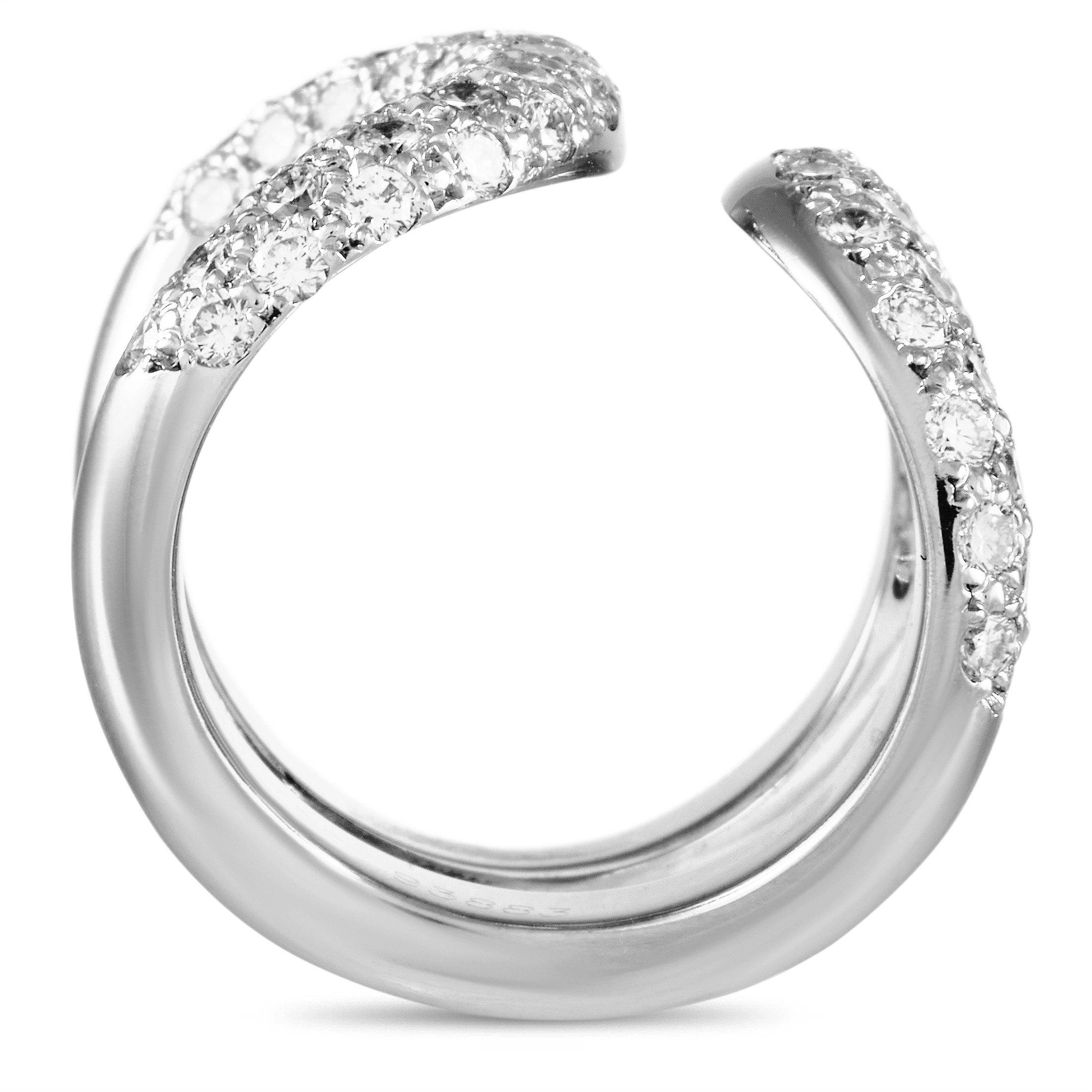 Curved lines and shimmering gemstones make this Hermes ring a true work of art. Crafted from opulent 18K White Gold, this elegant piece features a bold 15mm wide band and a 2mm top height. Diamonds totaling 1.80 carats ensure this piece always