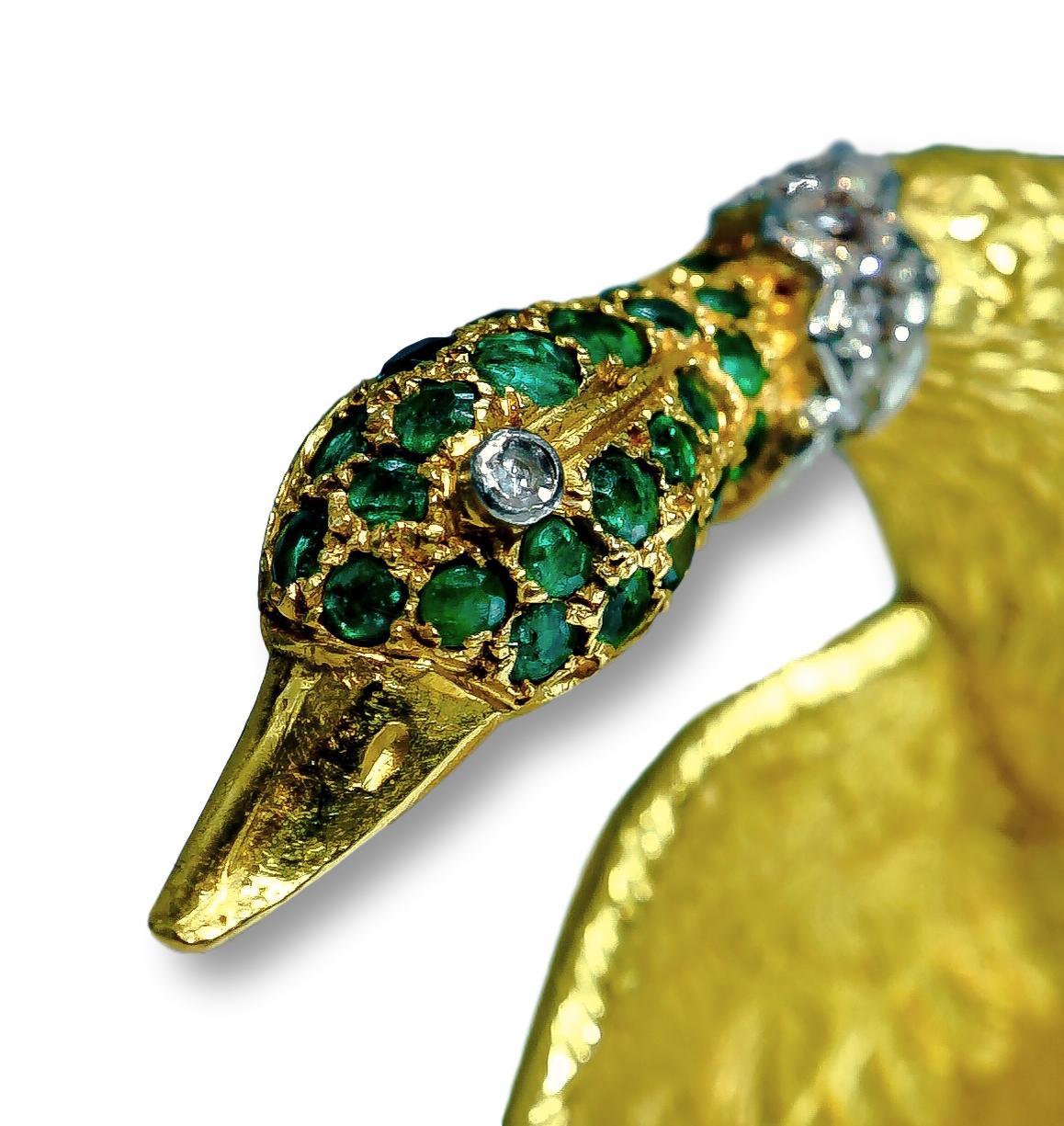 This Hermes Brooch is designed in the shape of an elegant bird, and sports Emeralds, Sapphires, and Diamonds on its 18K Yellow Gold Body. It is signed Hermes, and is of French Origin, circa 1960's - 1970s'. 

SKU#PB-02592