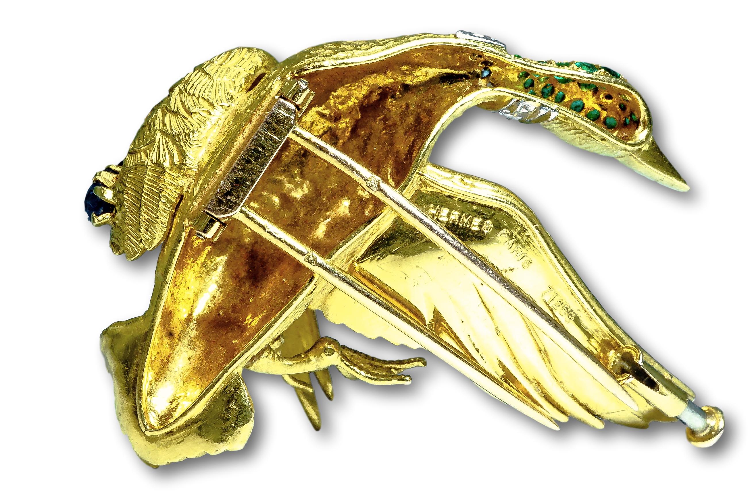 Hermes 18 Karat Yellow Gold Emerald Sapphire and Diamond Bird Brooch In Excellent Condition In New York, NY