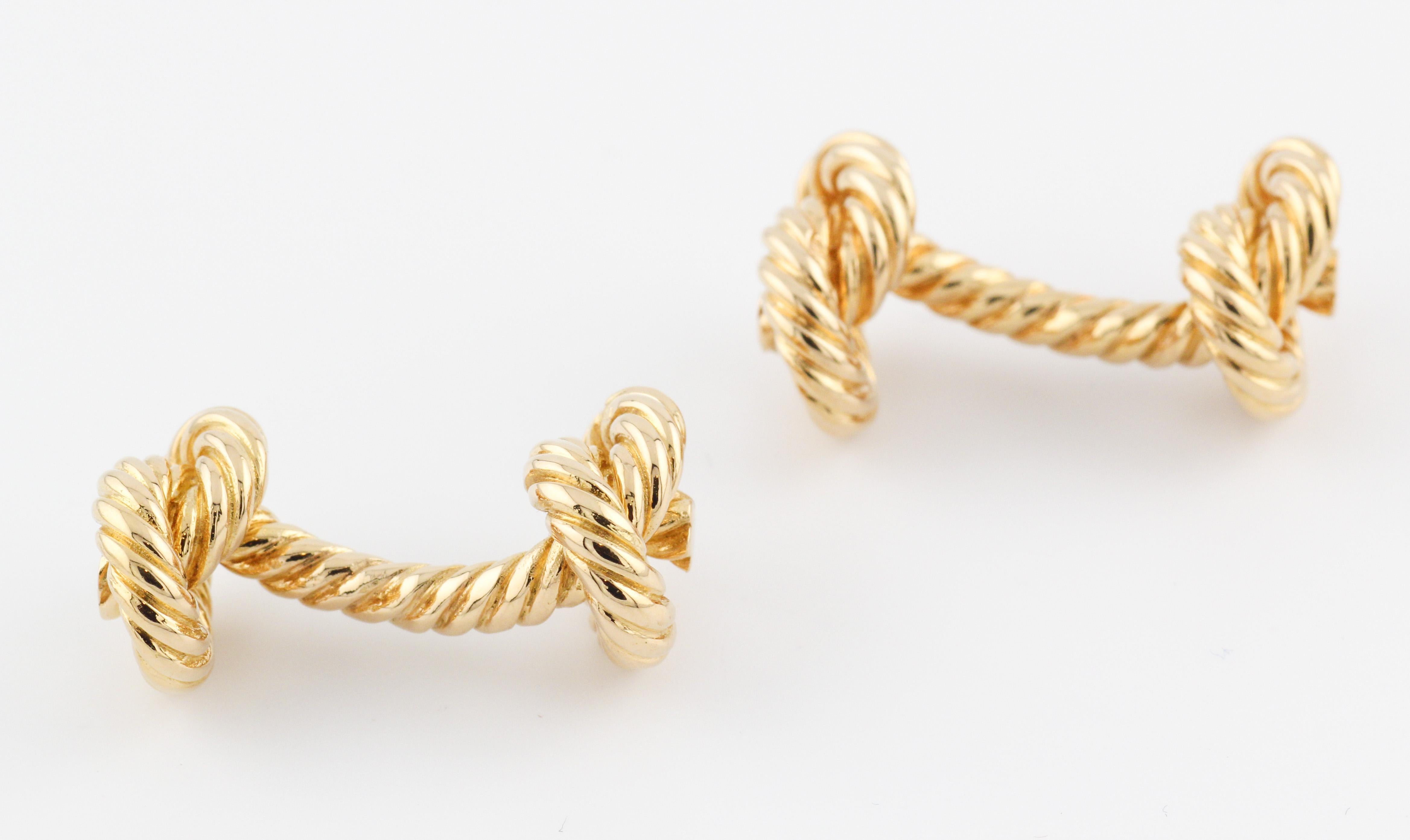 Immerse yourself in the world of rare luxury with these extraordinary Hermes 18K Yellow Gold Rope Knot Cufflinks. Elegance and craftsmanship converge in this exceptional pair, showcasing the iconic Hermes aesthetic with a distinctive touch.

Crafted