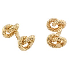 Boutons de manchette Hermes en or jaune 18 carats, nœud de corde