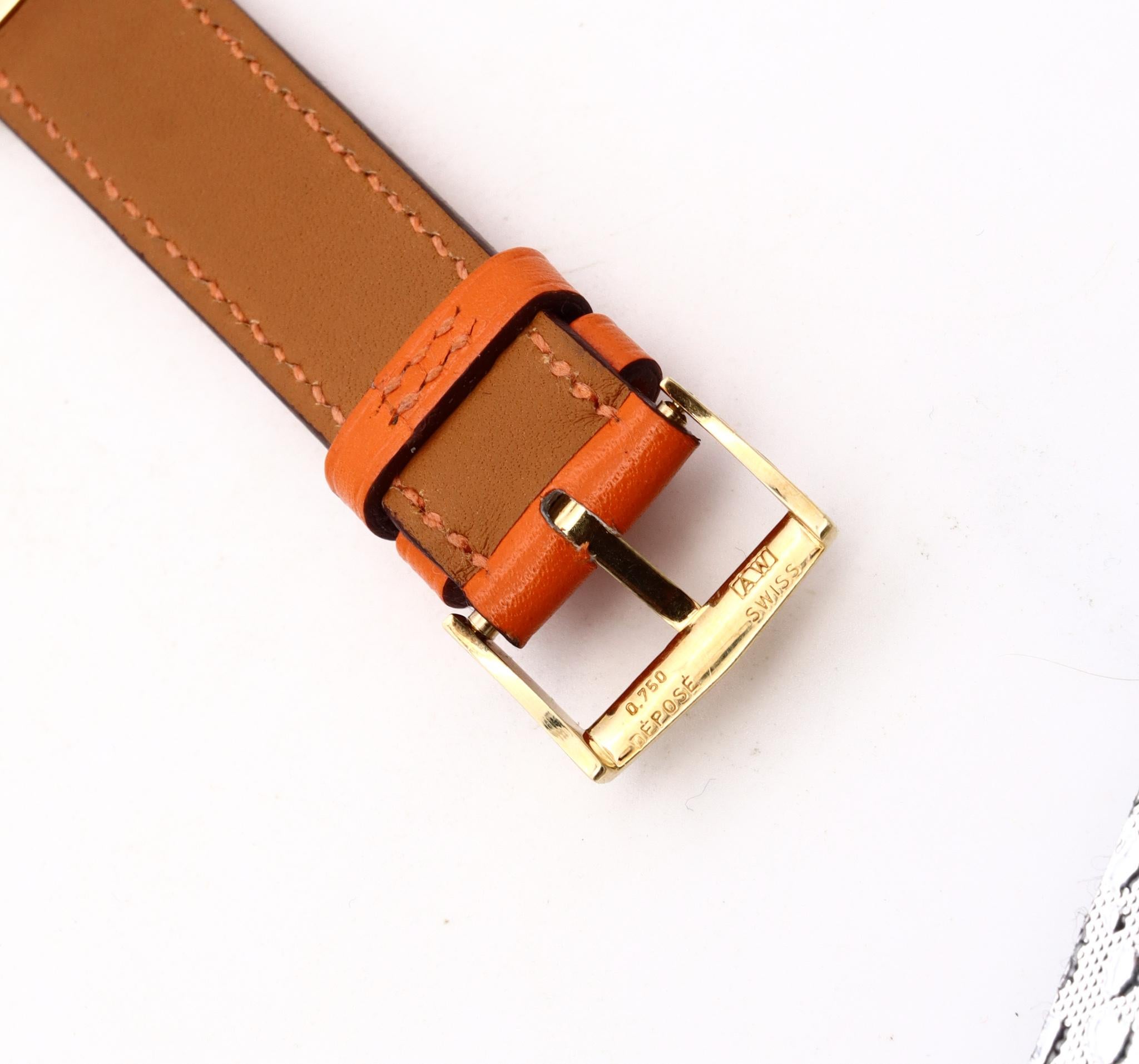 Modernist Hermes 1970 Paris 18Kt Yellow Gold Wristwatch with Rose Ebony Wood and Carvings For Sale
