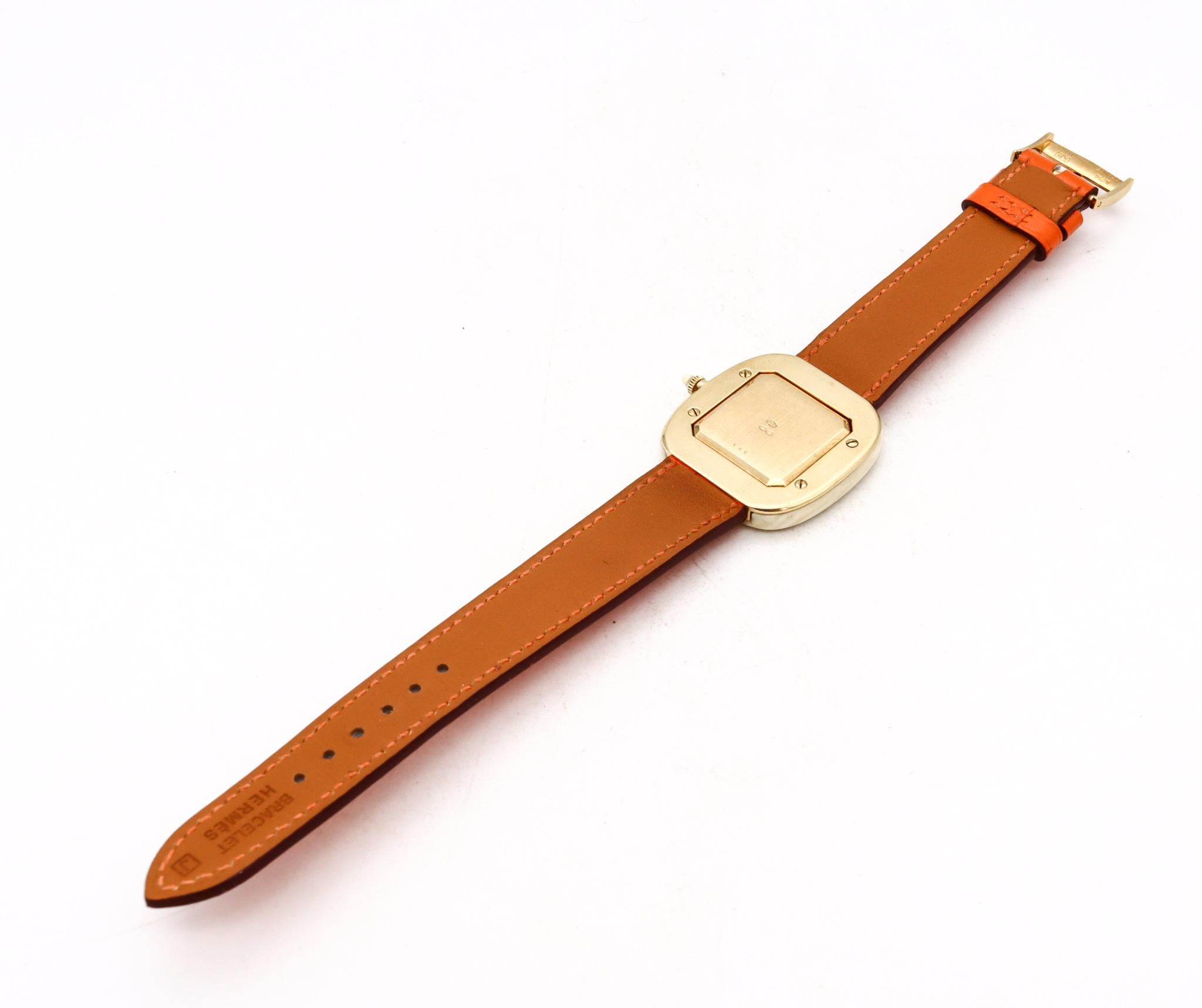 Women's or Men's Hermes 1970 Paris 18Kt Yellow Gold Wristwatch with Rose Ebony Wood and Carvings For Sale