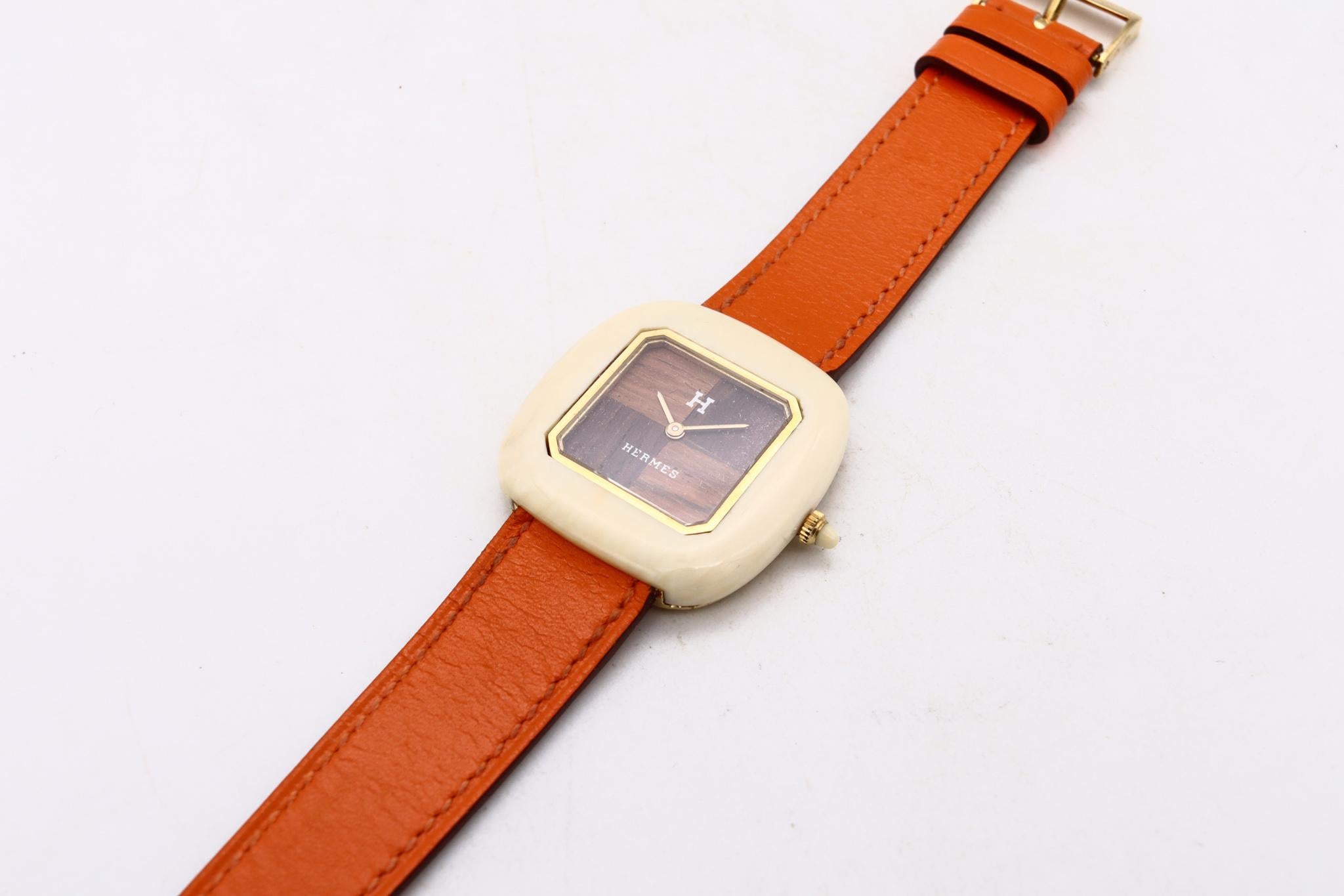 Hermes 1970 Paris 18Kt Yellow Gold Wristwatch with Rose Ebony Wood and Carvings For Sale 2