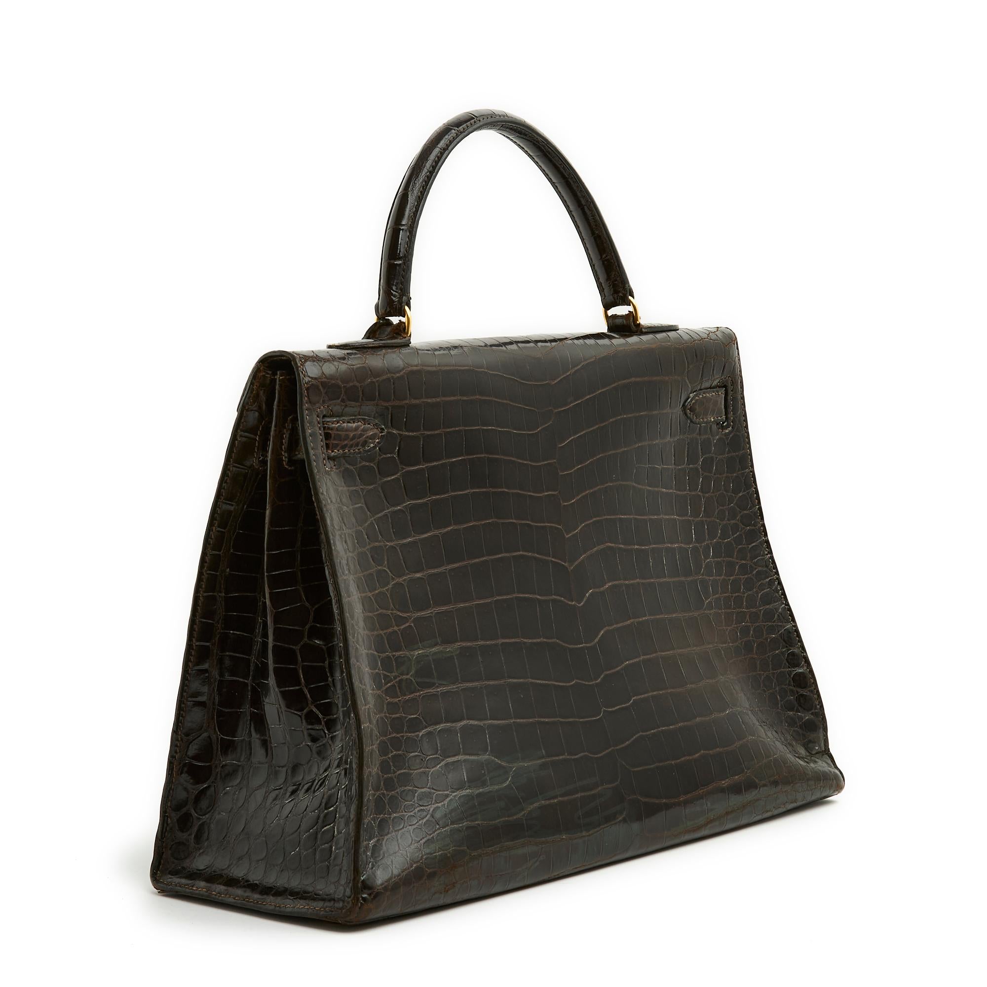 Hermès 1972 Sac Kelly 35 Hermes Precioso bolso de mano Kelly 35 de piel marrón Negro en venta