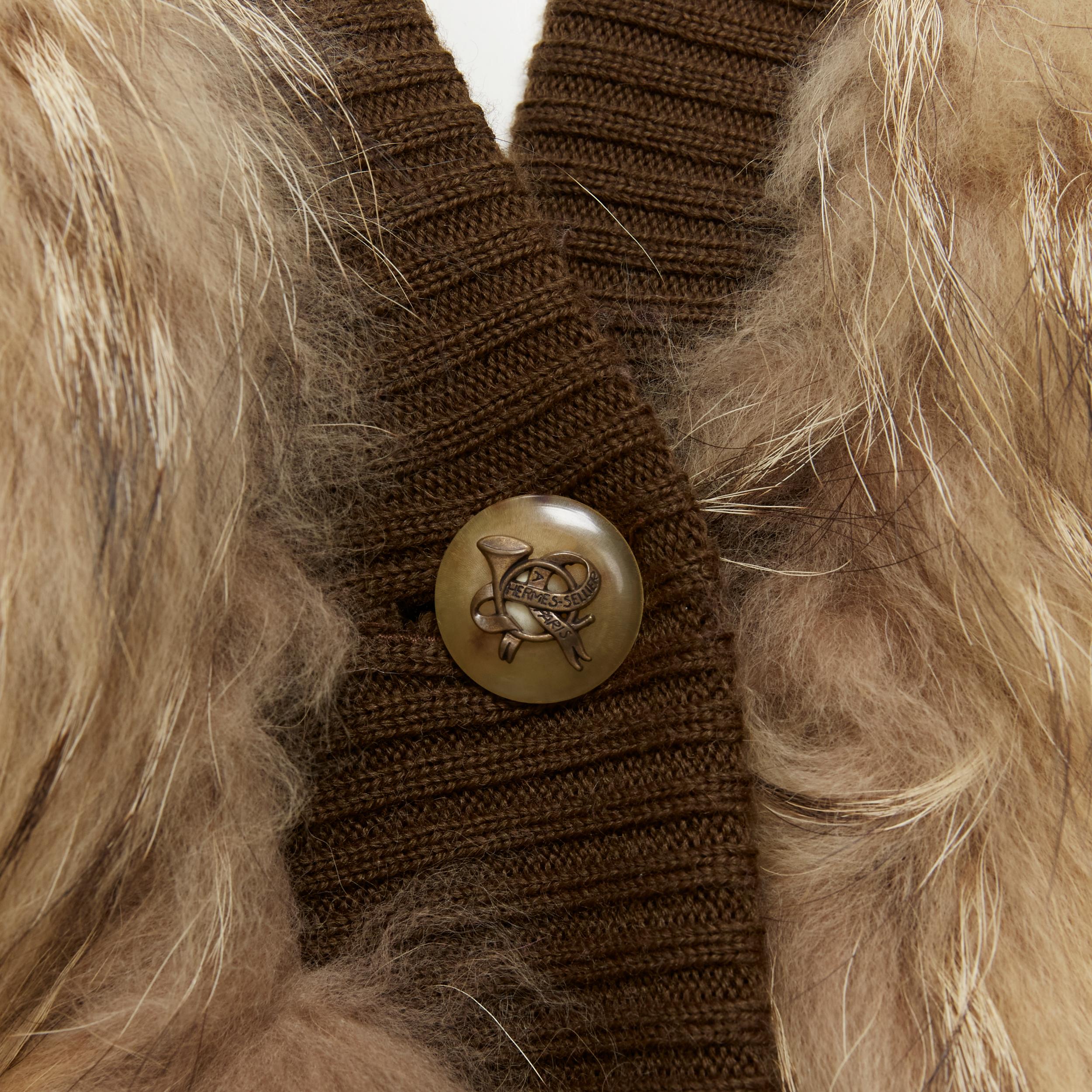 HERMES 1980s brown raccoon fur printed fur scarf lining jacket FR42 L 
Reference: ZING/A00167 
Brand: Hermes 
Collection: 1980's 
Material: Fur 
Color: Brown 
Pattern: Solid 
Closure: Button 
Extra Detail: Genuine Raccoon fur. Signature scarf print