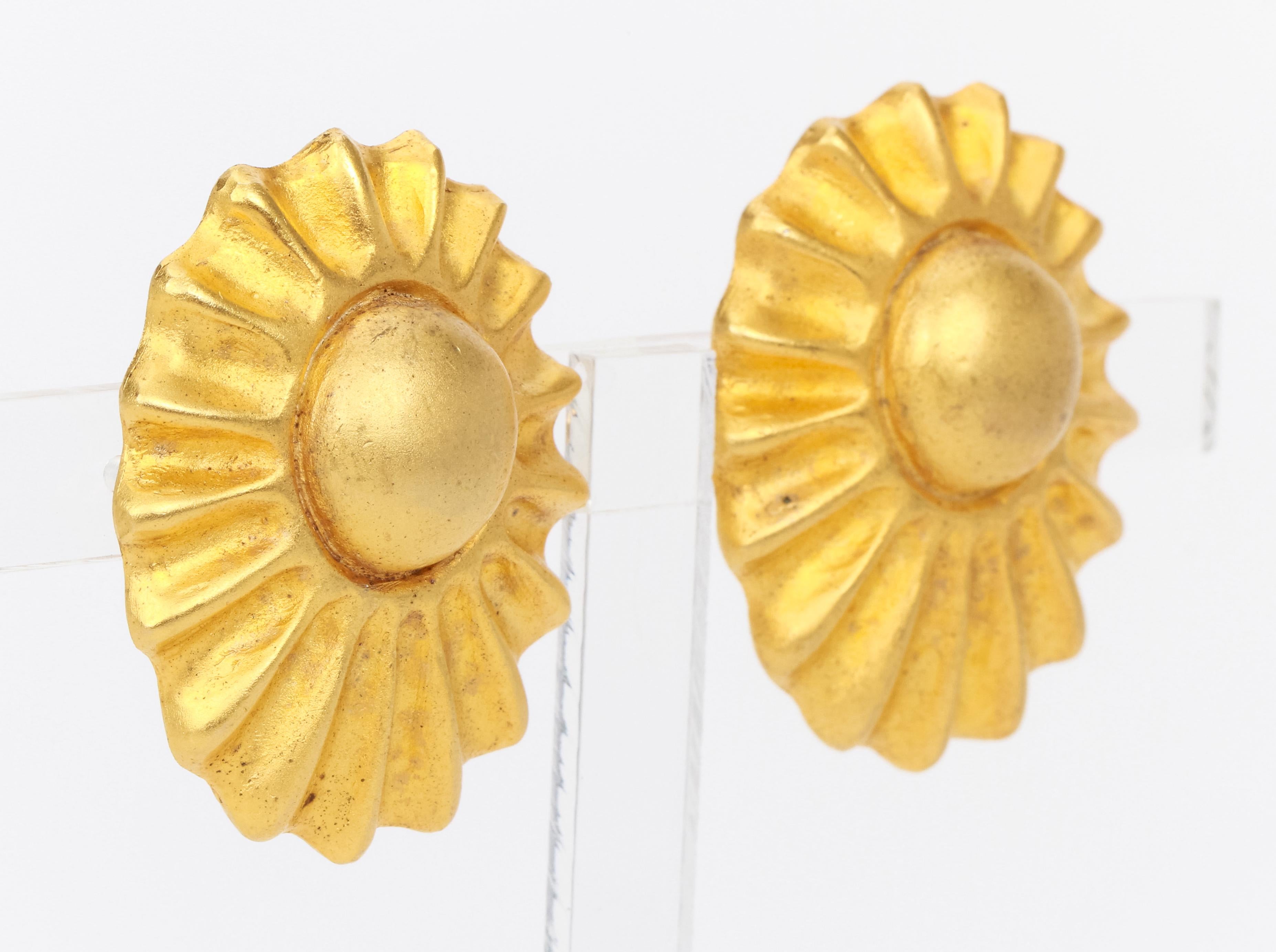 Hermes gold ear clips ,1980s, oval in shape, centered around a gold dome with a surrounding gold scallopped frame