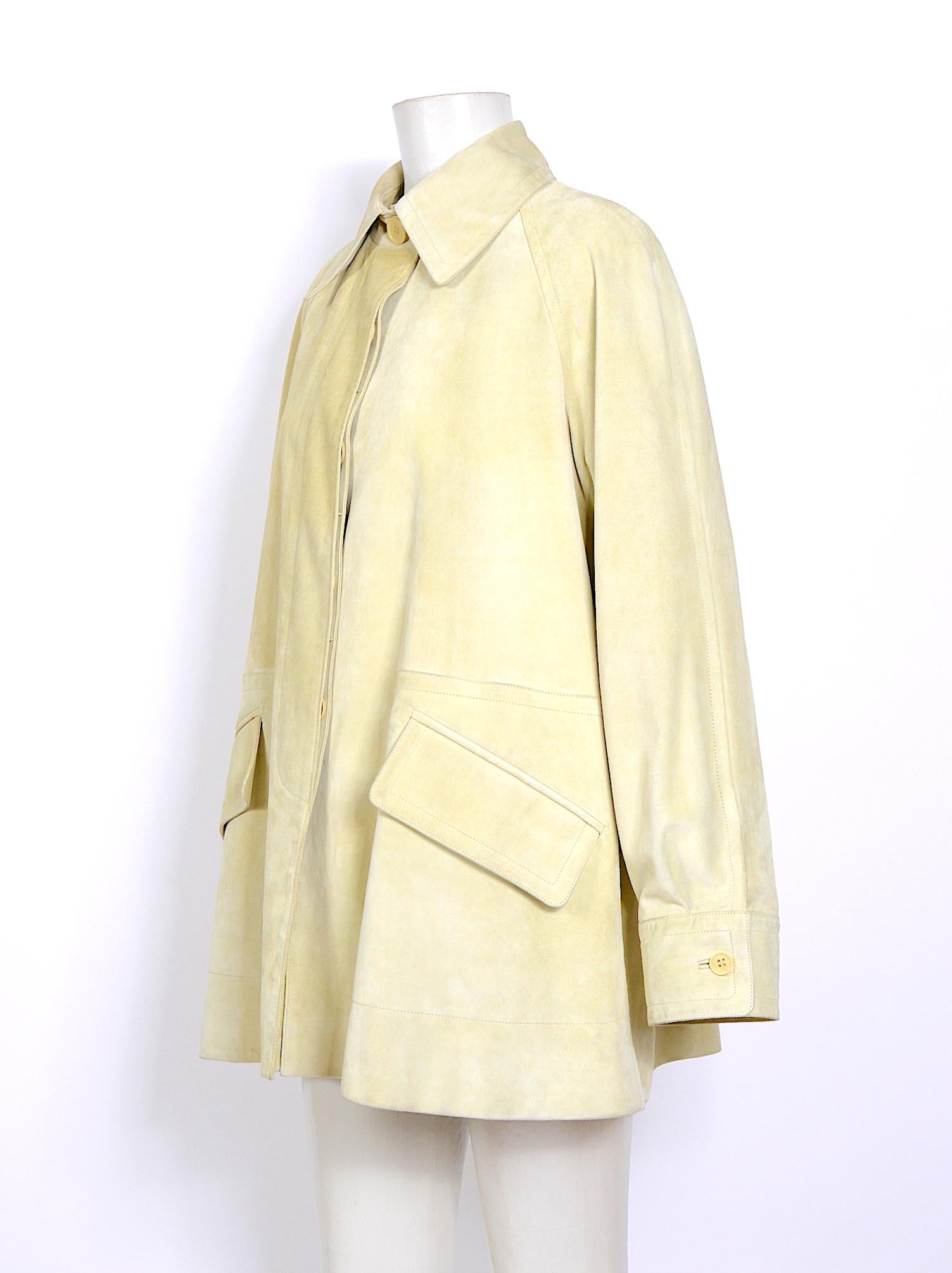 Hermes vintage very light color pastel pistachio/yellow suede swing style/ trapeze line jacket. The pictures don't do the jacket any justice, it is truly gorgeous in good vintage condition, with no stains or damage.
Silk signed Hermes