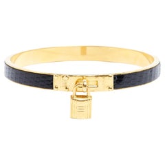 Hermès 1990s Bracelet Kelly Black Leather Golden Metal Bracelet Bangle Hermes