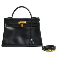 Hermes 1991 sac Kelly 32 Navy Box Sac en cuir et bandoulière Pristine