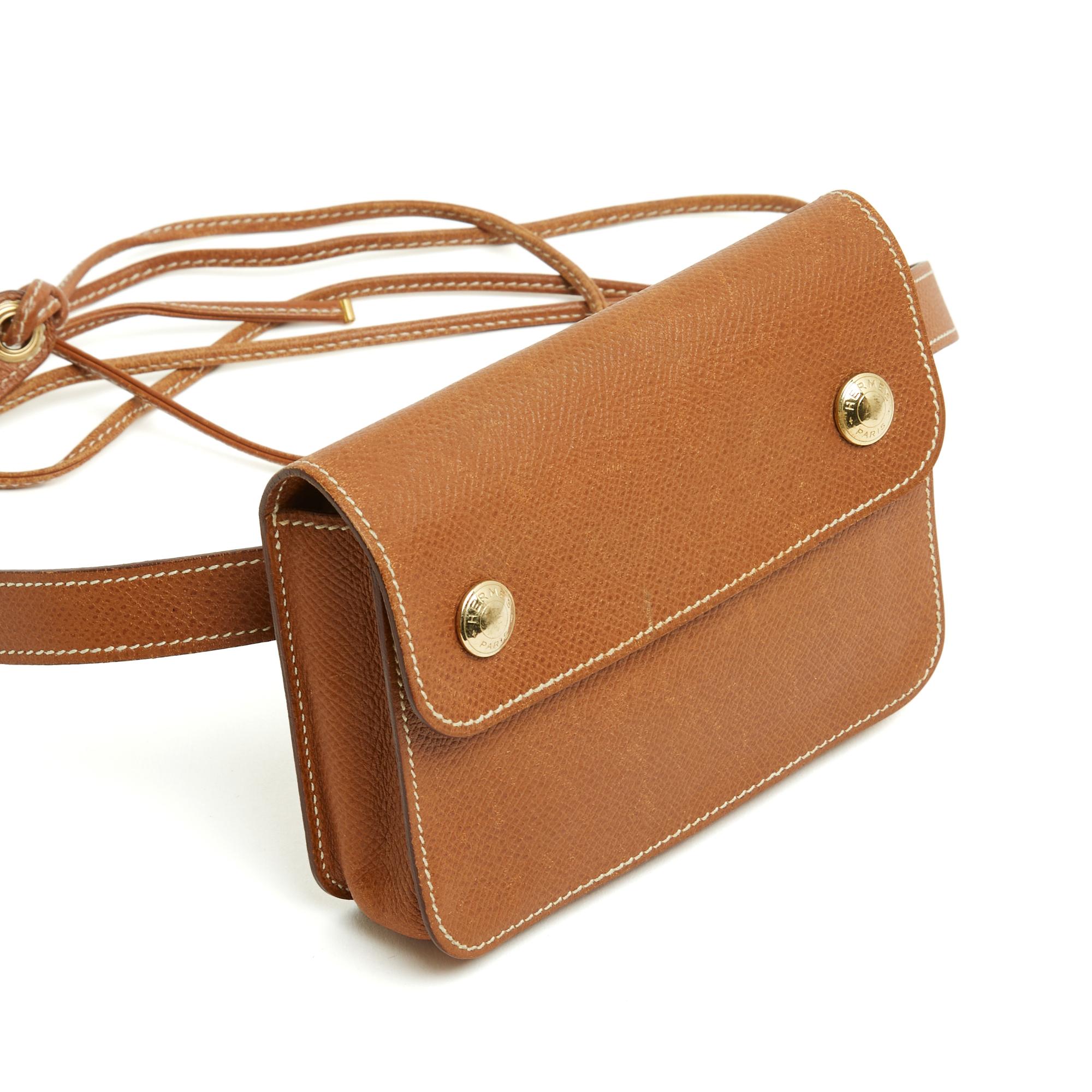 Hermès belt pouch Florida model in camel-colored Epsom leather composed of a simple pouch closed by 2 