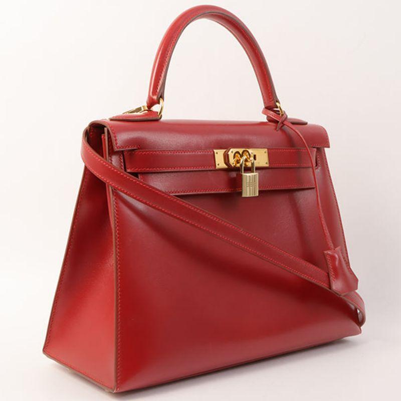Hermes 1997 Made Kelly Bag 28Cm Rouge Vif

Additional information:
Measurements: 28 W x 10 D x 21 H cm
Shoulder drop 85cm; Handle 27cm
Condition: Good
This item has been used and may have some minor flaws. Before purchasing, please refer to the