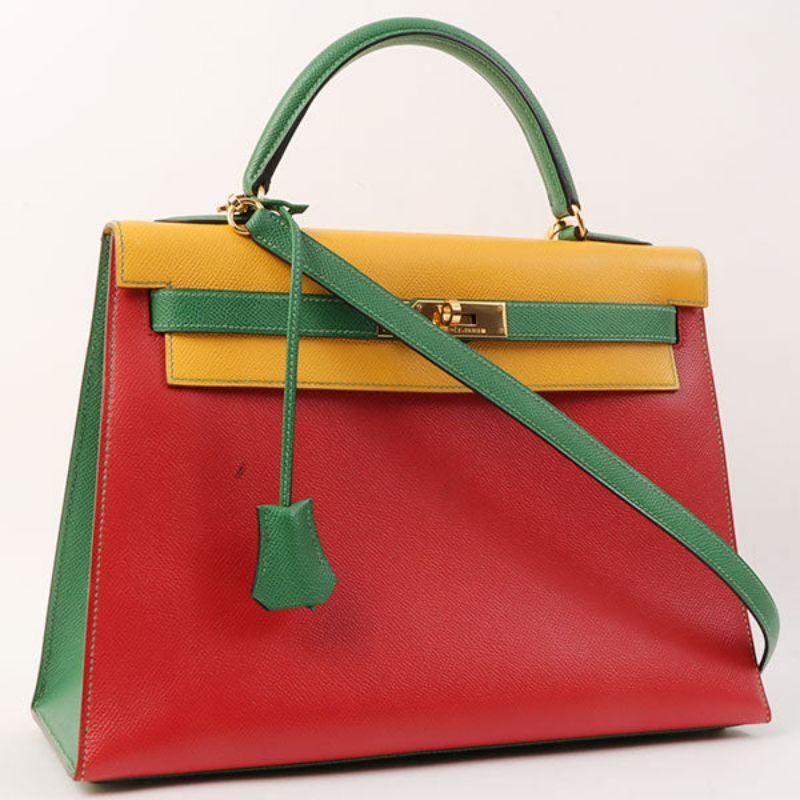 Hermes 1997 Made Kelly Bag 32Cm Red/Yellow/Green

Additional information:
Interior pocket x3
Accessories: Strap 1, Clochette 1
Material: Courchevel leather 1997
Made in France.
Size: 32 W x 12 D x 22 H cm
Shoulder drop: 89cm Handle 27cm.
Condition: