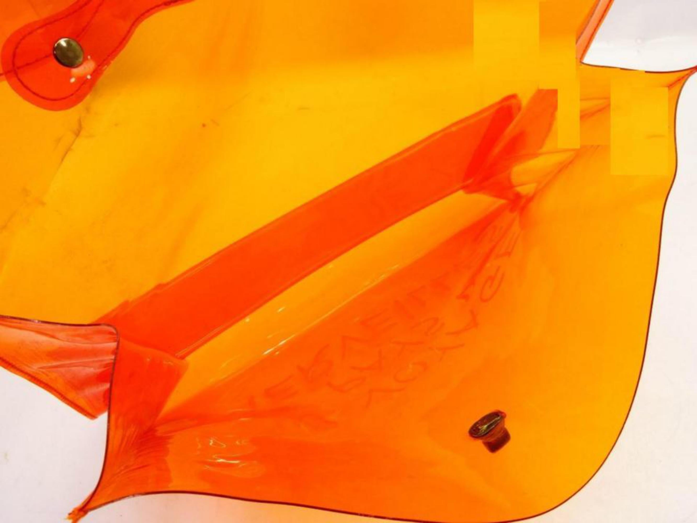 Hermès 1998 Clear Orange Souvenir De L'Exposition Kelly Translucent 241115
Measurements: Length: 15.5 