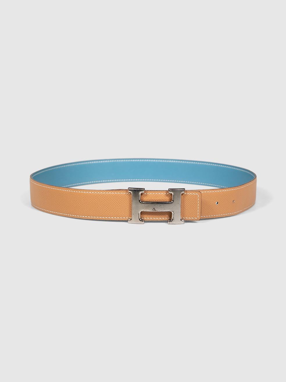 CONDITION is Very good. Minimal wear to belt is evident. Minimal wear to the buckle with scratches and tarnishing. The first hole on the belt has warped due to wear on this used Hermès designer resale item. Comes with original box.
 

 Details
 

