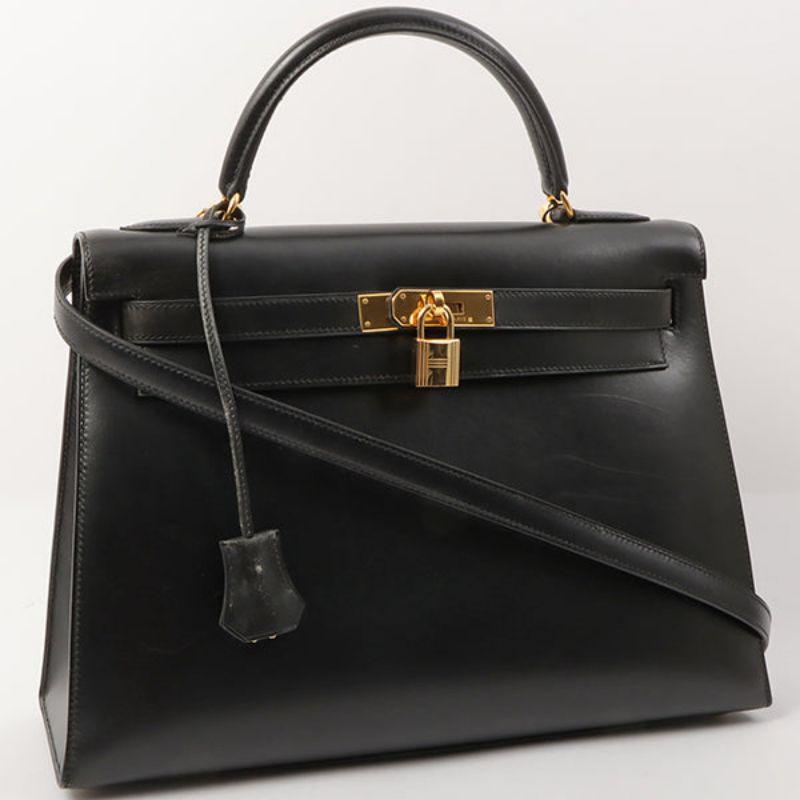 Hermes 1999 Made Kelly Bag 32Cm Black

Additional information:
Measurements: 32 W x 11 D x 22 H cm
Shoulder drop: 89 cm 
Handle: 27 cm
Condition: Good
This item has been used and may have some minor flaws. Before purchasing, please refer to the