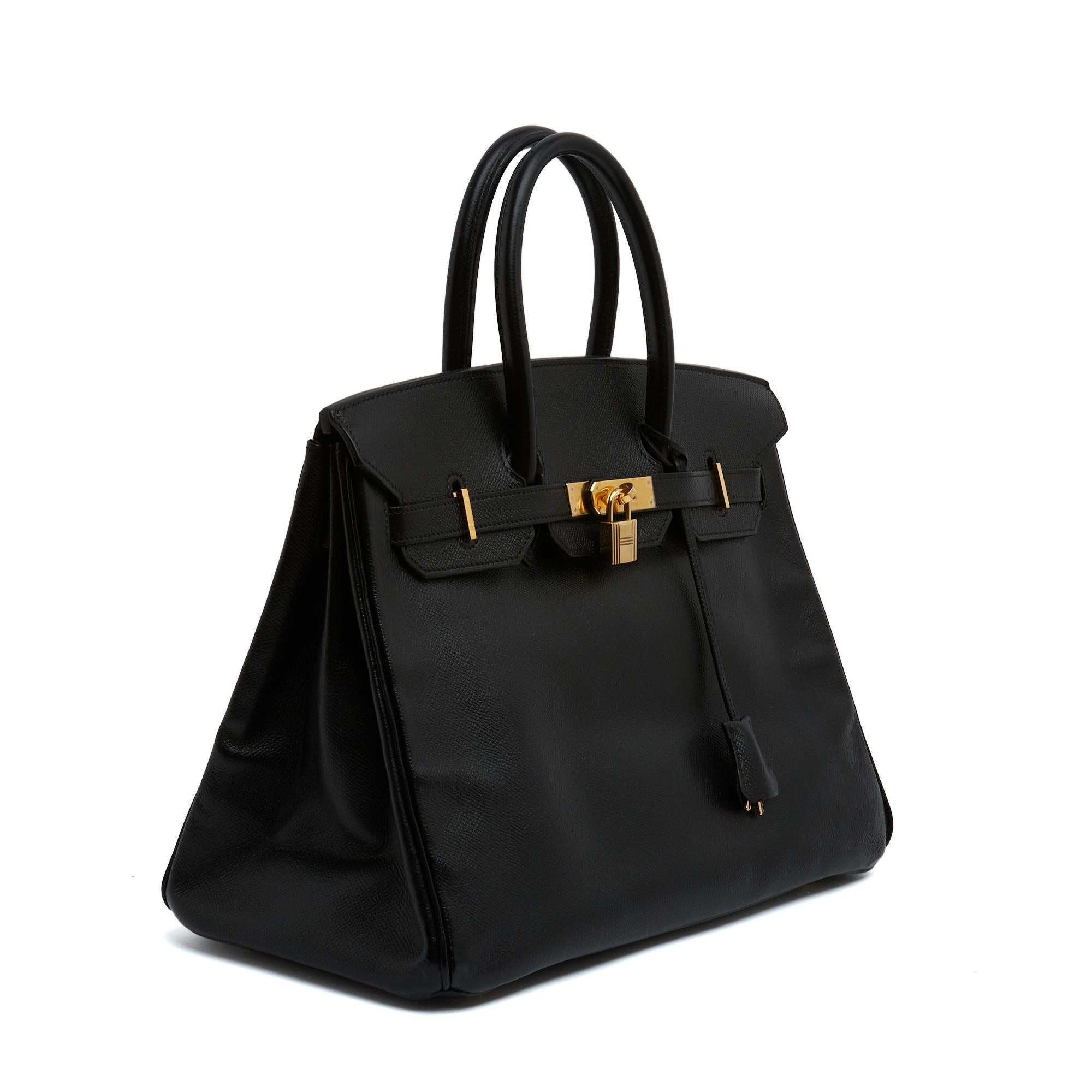 Sac Hermès Birkin, taille 35, en cuir Epsom beige reteinté noir et métal doré, clés, cadenas, fermeture éclair, cloche, sac à poussière, année 1999. Largeur 35 cm x hauteur 25 cm x profondeur 18 cm, poignée 30 cm. NOTA : le sac a d'abord été traité