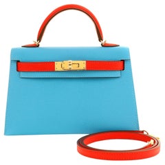 Hermès Mini Kelly a ferro di cavallo blu e rosso da 20 cm