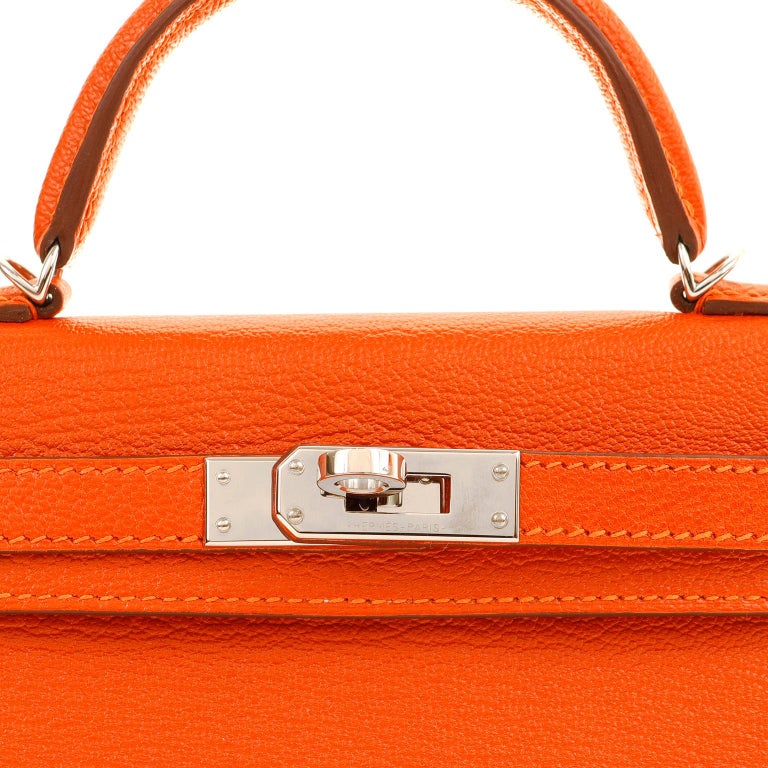 Hermès 20 cm Orange Chevre Mini Kelly with Palladium For Sale at
