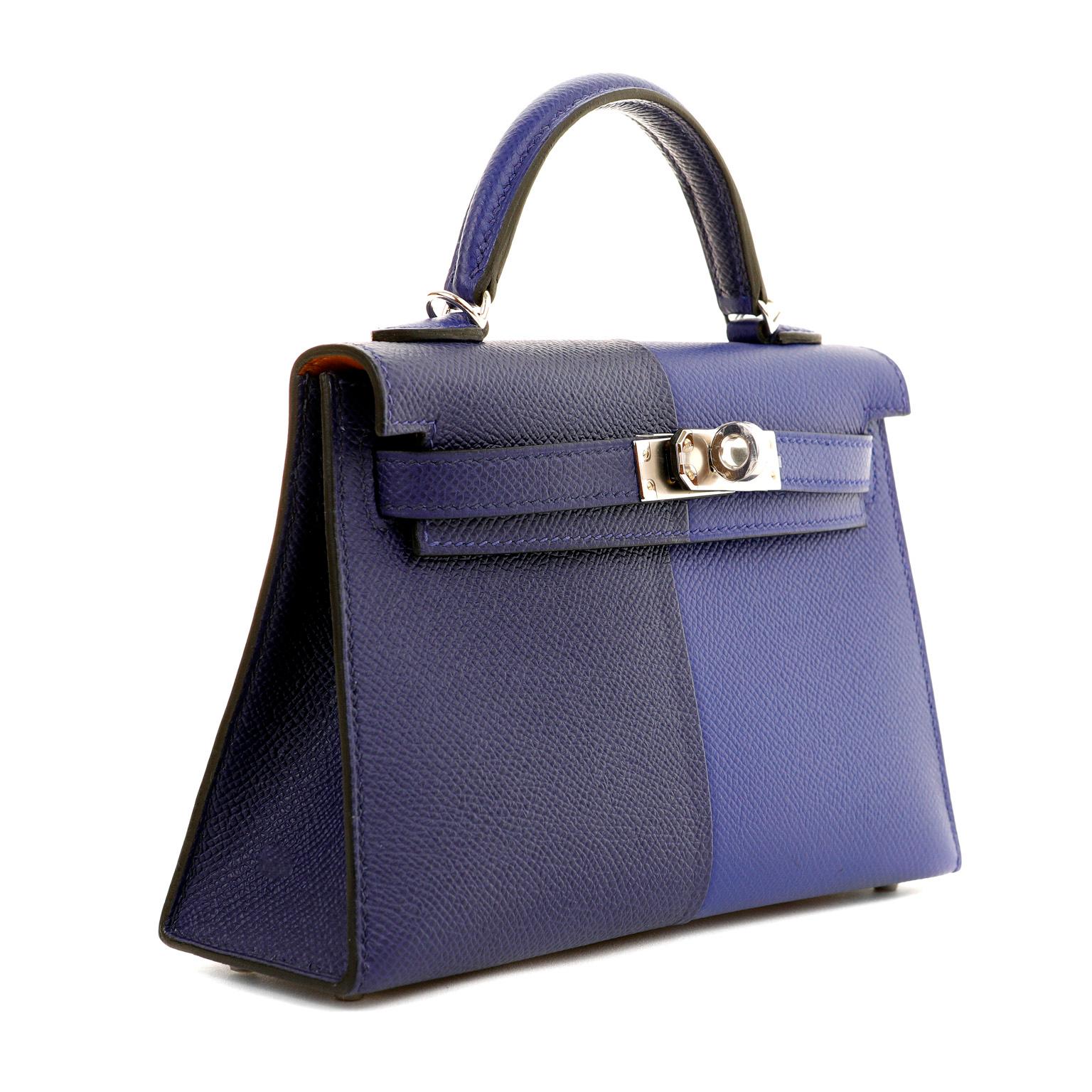This authentic Hermès 20 cm Special Edition Blue Bi Color Epsom Mini Kelly is pristine with the protective plastic intact on the hardware.  Petite and feminine, the crossbody Kelly is very collectible in the 20 cm silhouette.  Blue Electric and Blue