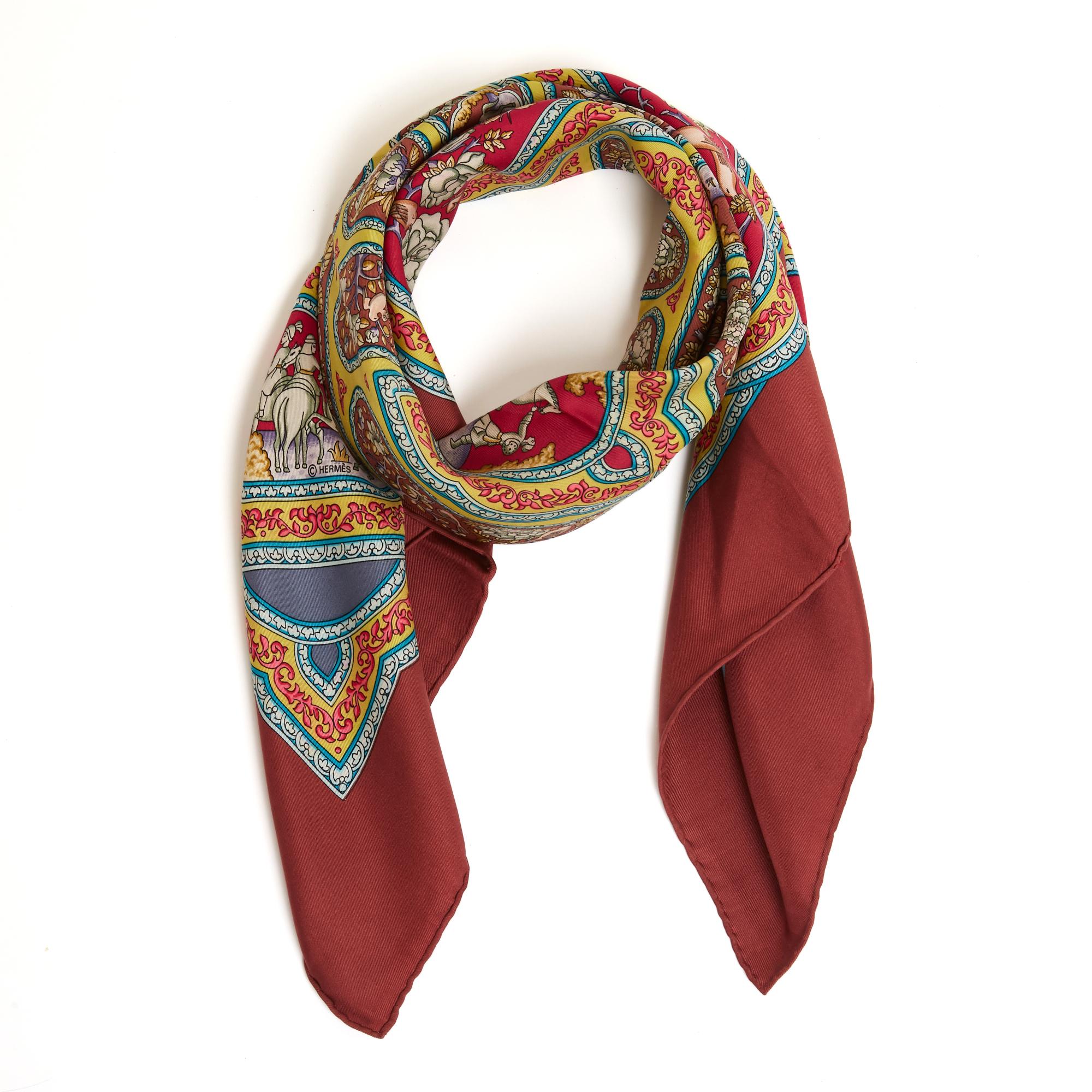 Hermès square scarf 90 in silk twill, Qalamdan pattern by Catherine Baschet, published in 1990 and reissued in 2000 (probably like this one), in orange and yellow-green tones, burgundy edges and background. Width 90 cm x length 90 cm approximately.
