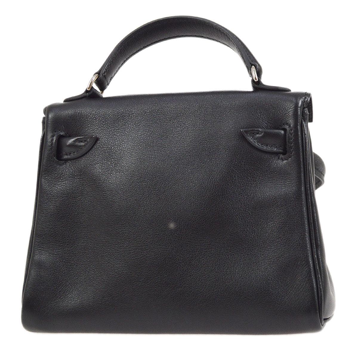 Hermes 2000 Bolso Kelly Doll Negro Gulliver

Más información:
Color / Material : Negro / Veau Gulliver
Viene con : Bolsa guardapolvo, Caja
Tamaño (pulgadas) : Anchura 6,3 x Altura 4,5 x Profundidad 2,6 