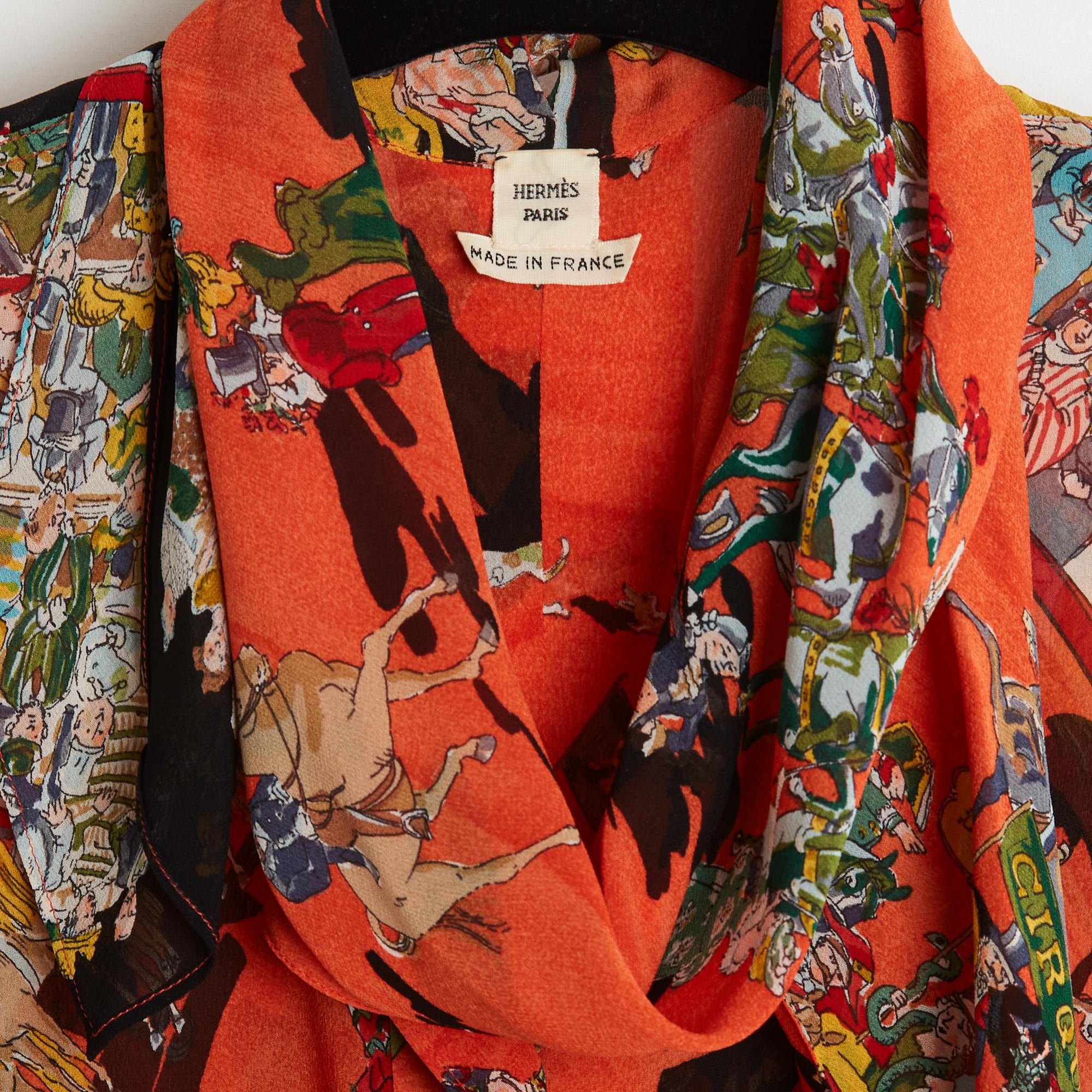Hermès top circa 2004 silk crepe blouse printed on a dark orange background with Le Cirque Mollier motif by Philippe Dumas, sleeveless, lavallière at the collar closed by 5 hidden buttons with the Hermès logo. Size 34FR or UK6 and US4: shoulders 33