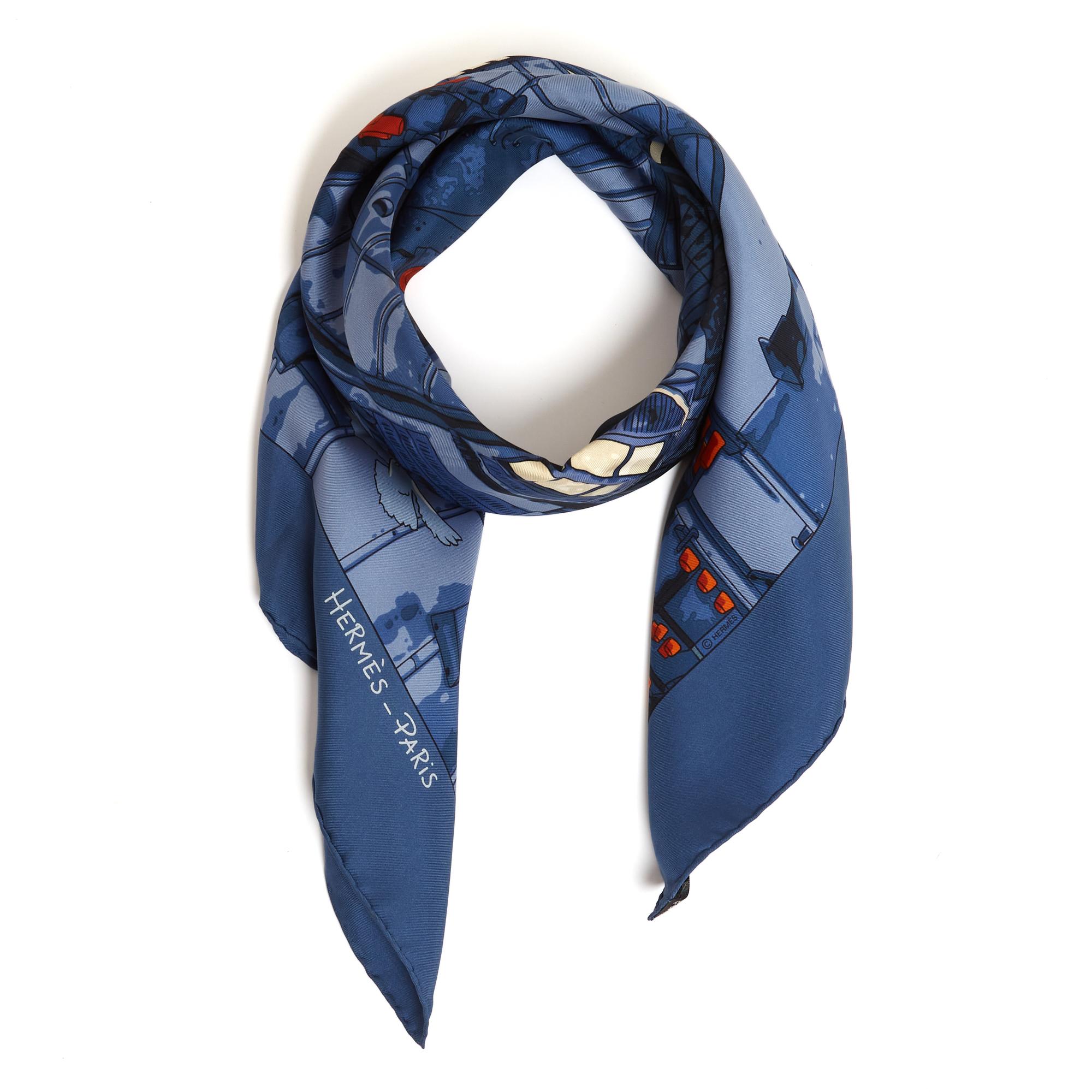Hermès square scarf 90 in silk twill titled Les Toits de Paris by Dimitri Rybaltchenko, published in 2006 and never reissued, in shades of midnight blue. Width x length approximately 90 cm. The scarf is in very good condition, rare, sought after,
