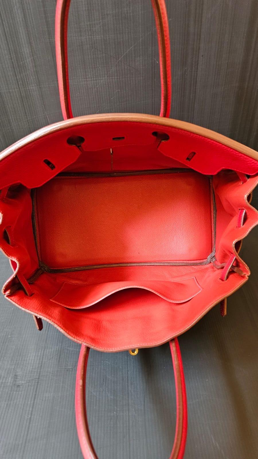 Classic birkin 35 in togo rouge garance with gold hardware. Stamp Square J (2006). Beautiful condition, with minor rubbing on the corners and faint scratches on the hardware. Slight rubbing on the leather handles. Already have bababebi