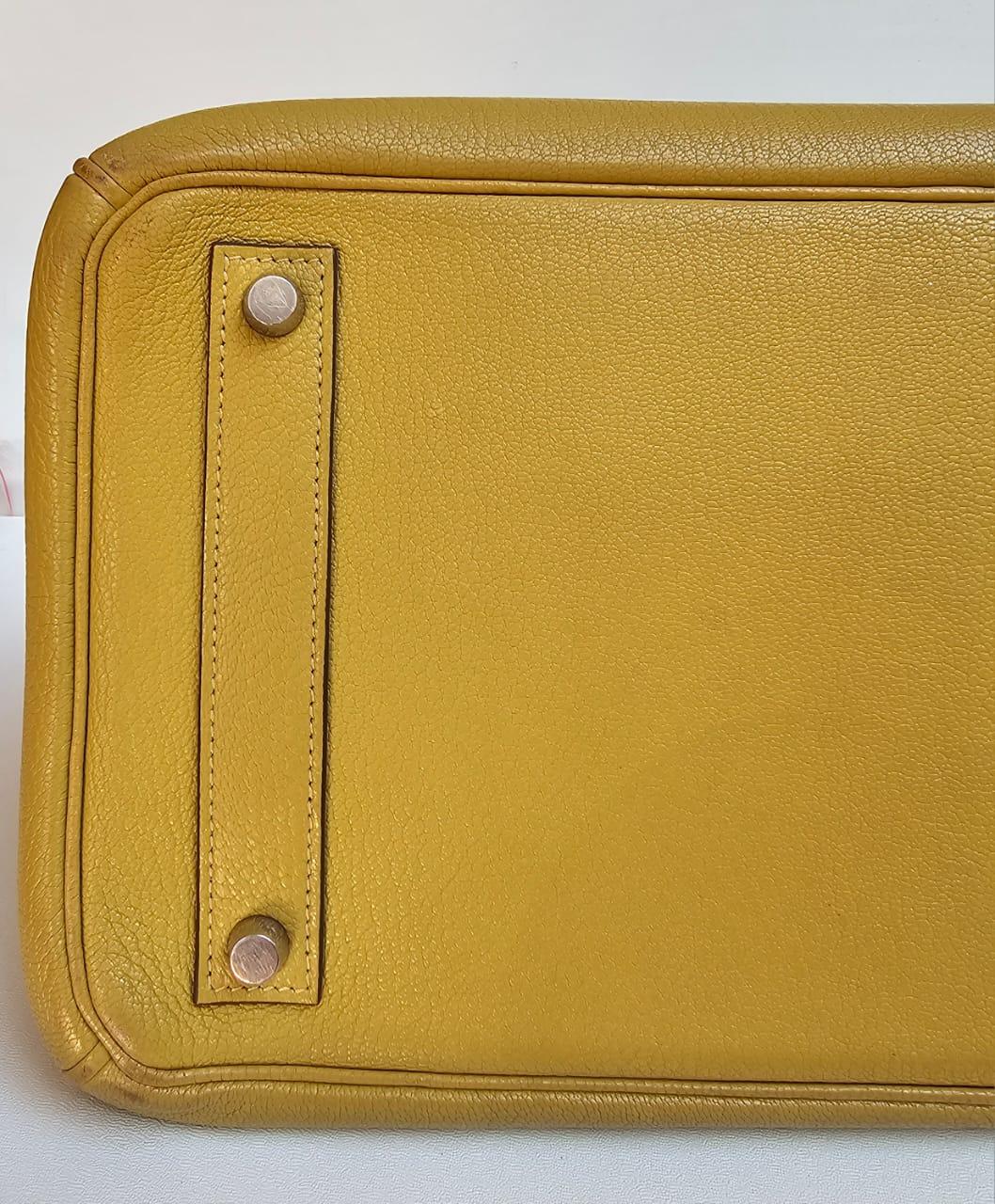 Beautiful rare birkin hac 36 in lime chevre with palladium hardware. Overall still in great condition. Light rubbing marks on the backside due to the nature of the leather. Handle has slighly suppled. Comes with dust bag, clochette, keys, padlock,