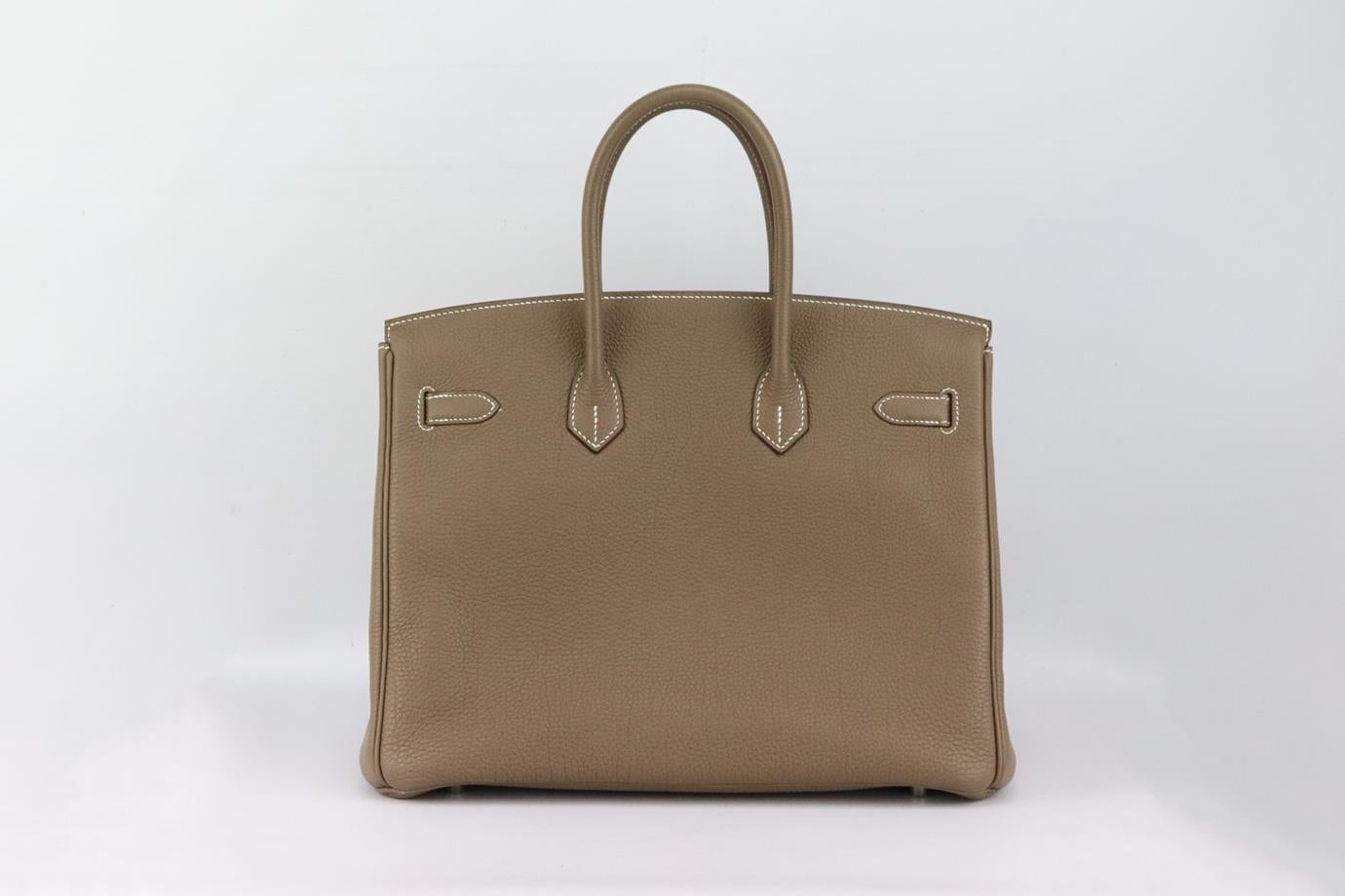 Hermès 2011 Birkin 35cm Togo leather bag. Made in France, this beautiful 2011 Hermès ‘Birkin’ 35cm handbag has been made from taupe ‘Togo’ leather exterior in ‘Etoupe’ with matching interior, this piece is decorated with silver hardware. Taupe