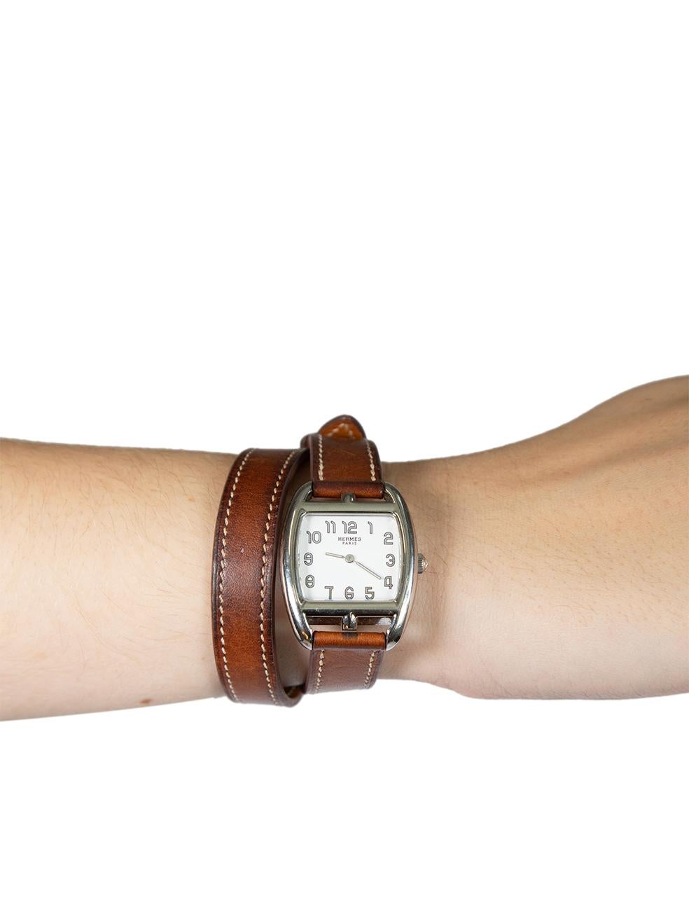 CONDITION is Very good. Minimal wear to watch is evident. The leather strap is discoloured, especially where the buckle has been resting. There are light abrasions along the outside and inside surfaces. The steel bezel has light surface abrasions on