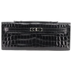 Hermès 2011 Kelly Cut Niloticus Crocodile And Leather Clutch