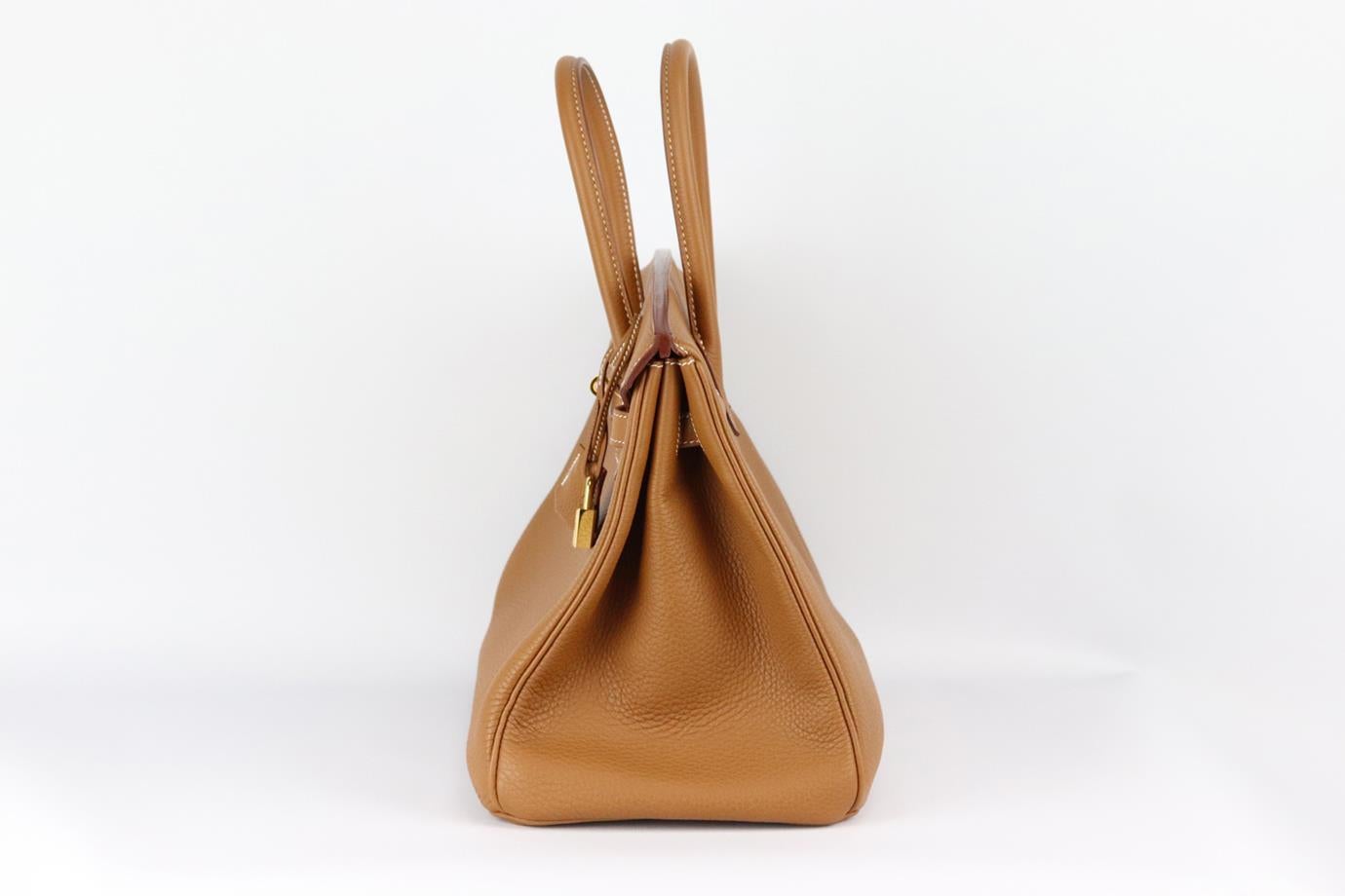 <ul>
<li>Hermès 2012 Birkin 35cm Veau Togo sac en cuir.</li>
<li>Fabriqué en France, ce magnifique sac à main Hermès 'Birkin' 2012 a été réalisé en cuir Veau Togo de couleur havane avec un intérieur en cuir assorti. Il est décoré de ferrures de