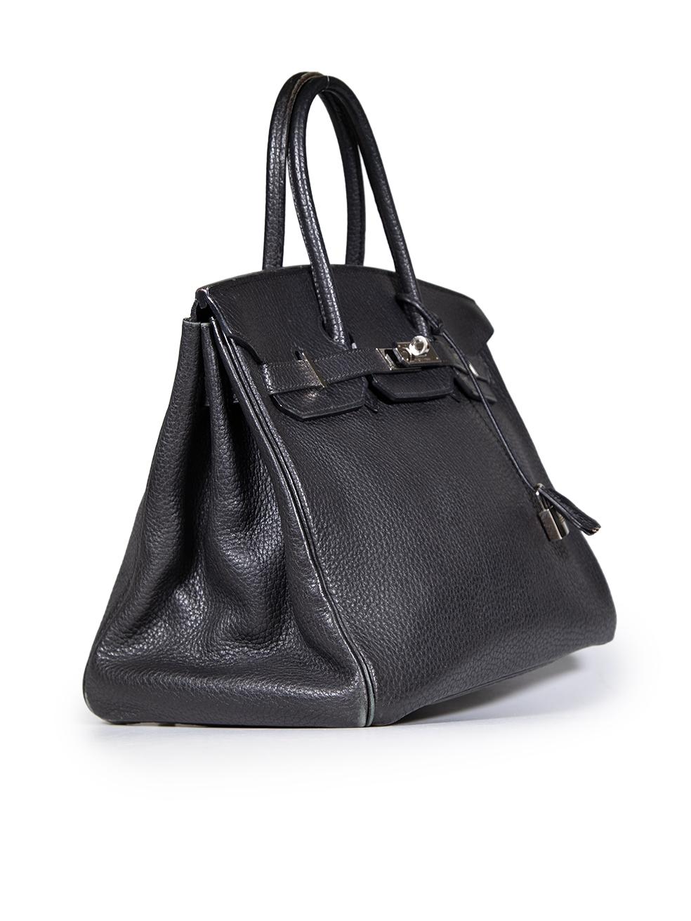 CONDITION is Very good. Minimal wear to the bag is evident. Discolouration on the left corner of the flap. Abrasion to the base corners, base rim, base, the rim of the bag opening, flap, both handles and the inside front pocket. Deterioration and
