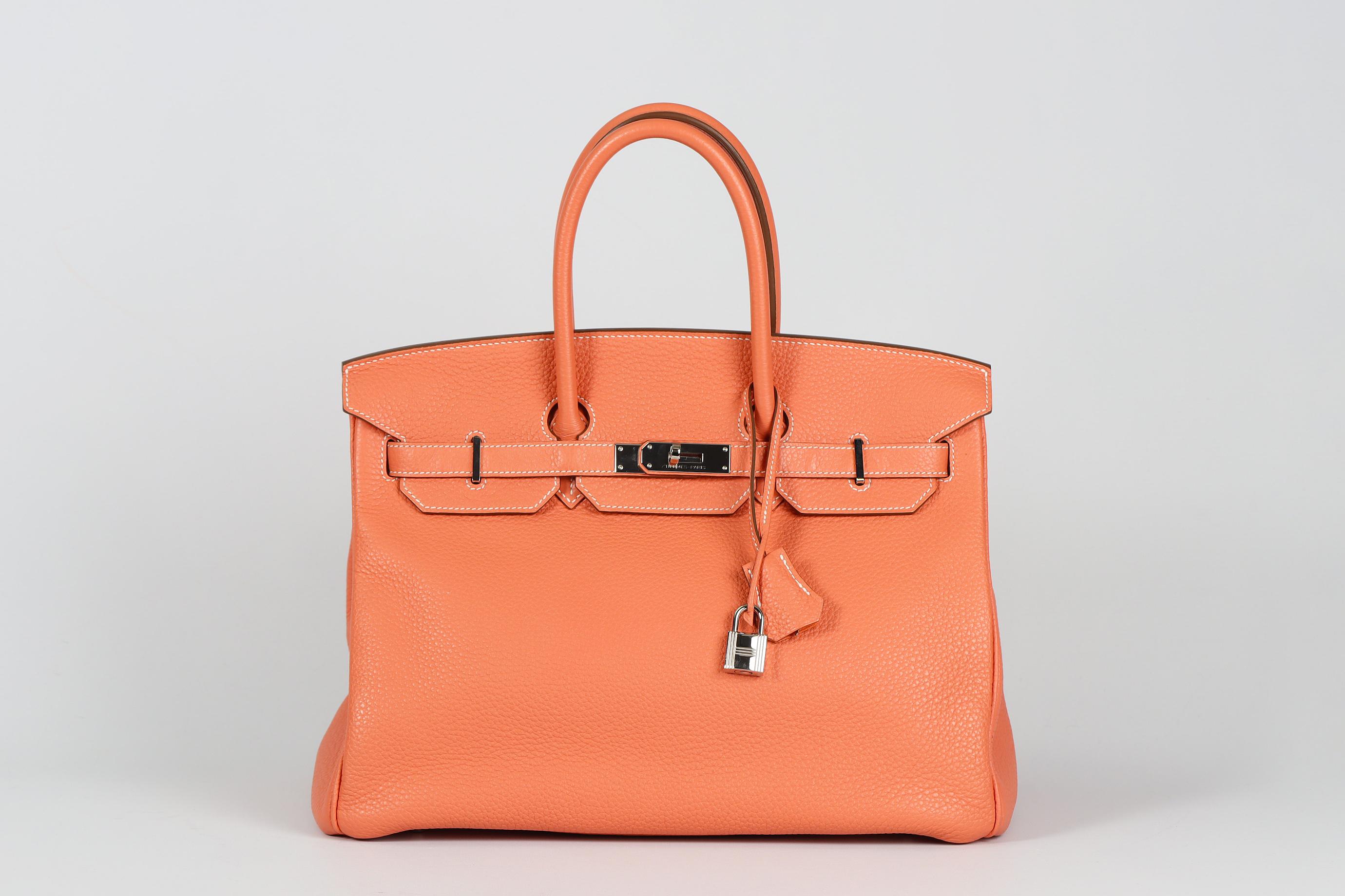 <ul>
<li>Hermès 2013 Birkin 35Cm Clemence Leather Bag.</li>
<li>Salmon Pink.</li>
<li>Made in France, this beautiful 2013 Hermès ‘Birkin’ handbag has been made from salmon-pink ‘Clemence’ leather exterior in ‘Crevette’ with matching leather