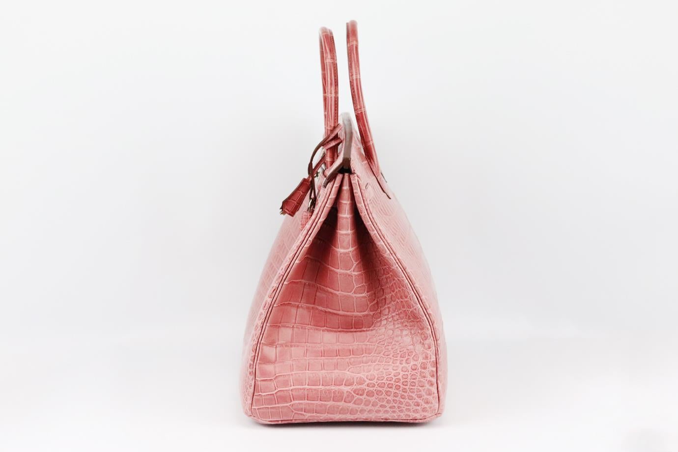 Hermès 2013 Birkin 40cm Matte Crocodile Porosus leather bag. Made in France, this beautiful 2013 Hermès ‘Birkin’ handbag has been made from a dusty pink-tone ‘Matte Crocodile Porosus’ exterior in ‘Bois de Rose’, this piece is decorated with silver