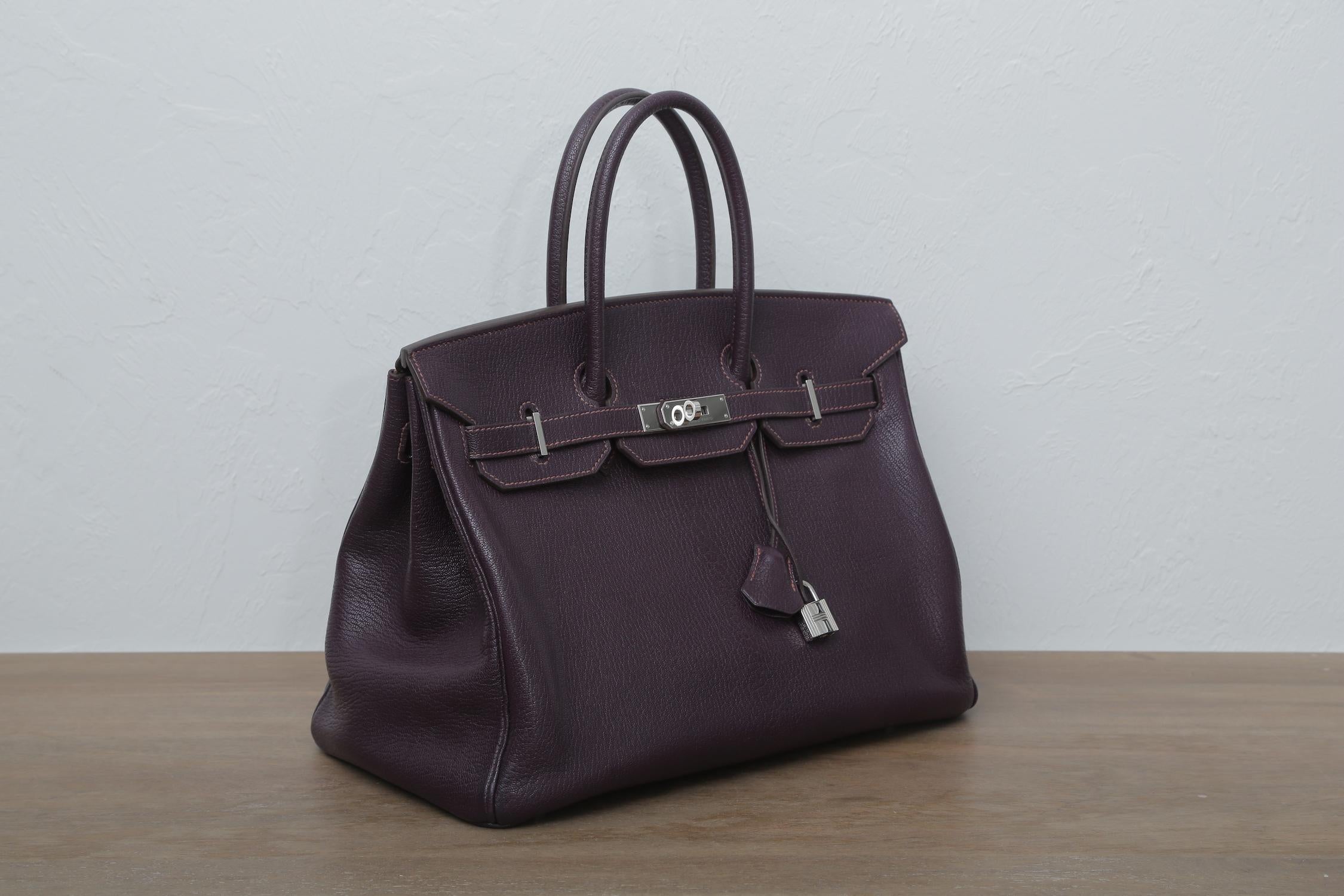 Hermes 2014 Birkin 35 Raisin with Palladium Hardware R in a Square with duster.