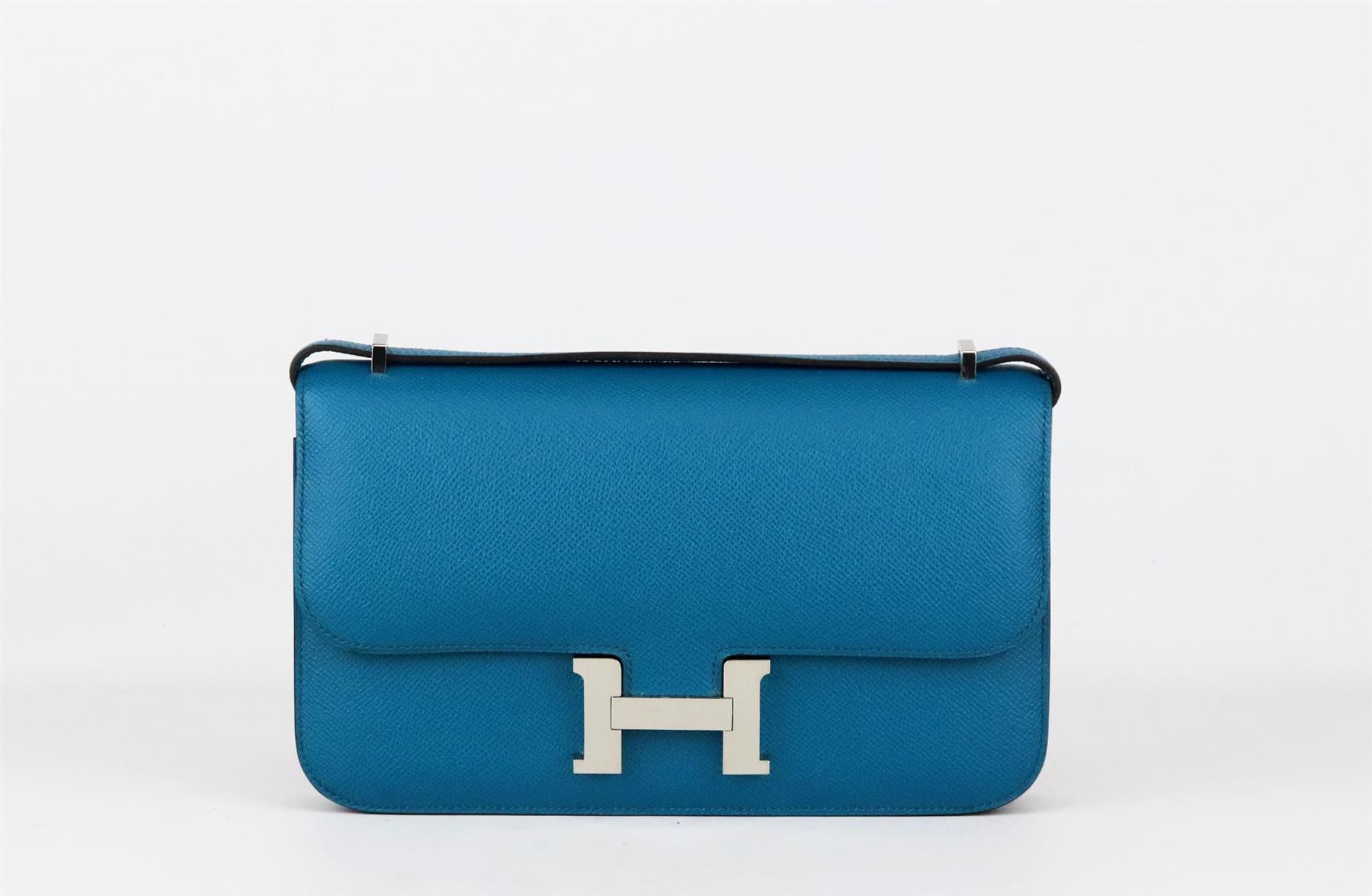 <ul>
<li>Made in France, this beautiful 2014 Hermès ‘Constance Elan’ handbag has been made from textured Epsom leather exterior in a teal/turquoise hue and soft leather interior, it is decorated with palladium hardware on the front and finished with