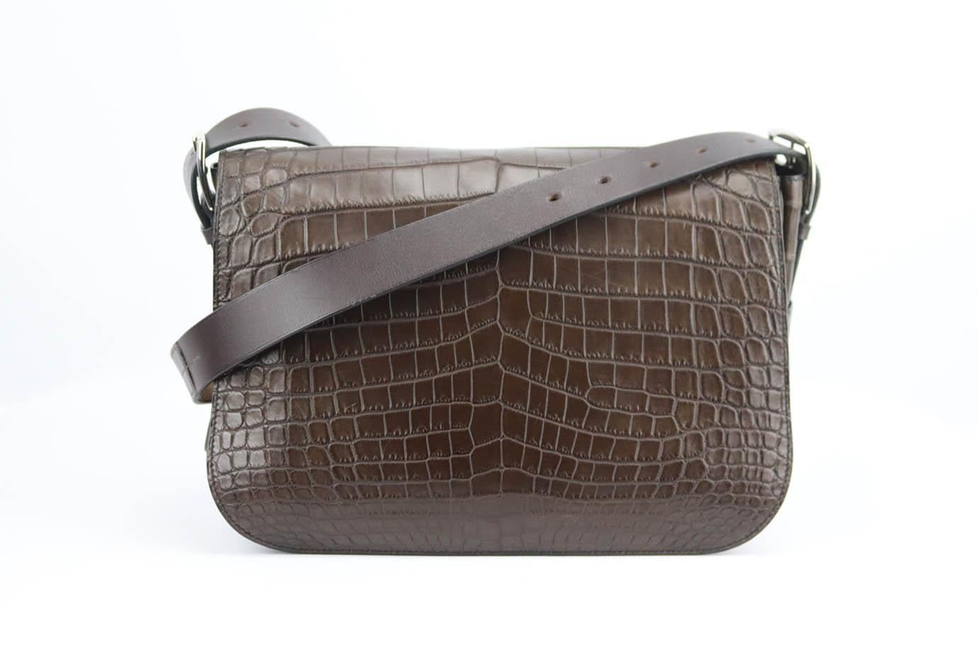 Hermès 2015 Barda 30cm matte niloticus crocodile leather bag. Made in France, this beautiful 2015 Hermès ‘Barda’ shoulder bag has been made from brown-tone ‘Matte Niloticus Crocodile’ exterior in ‘Ebene’ with matching leather interior, this piece is