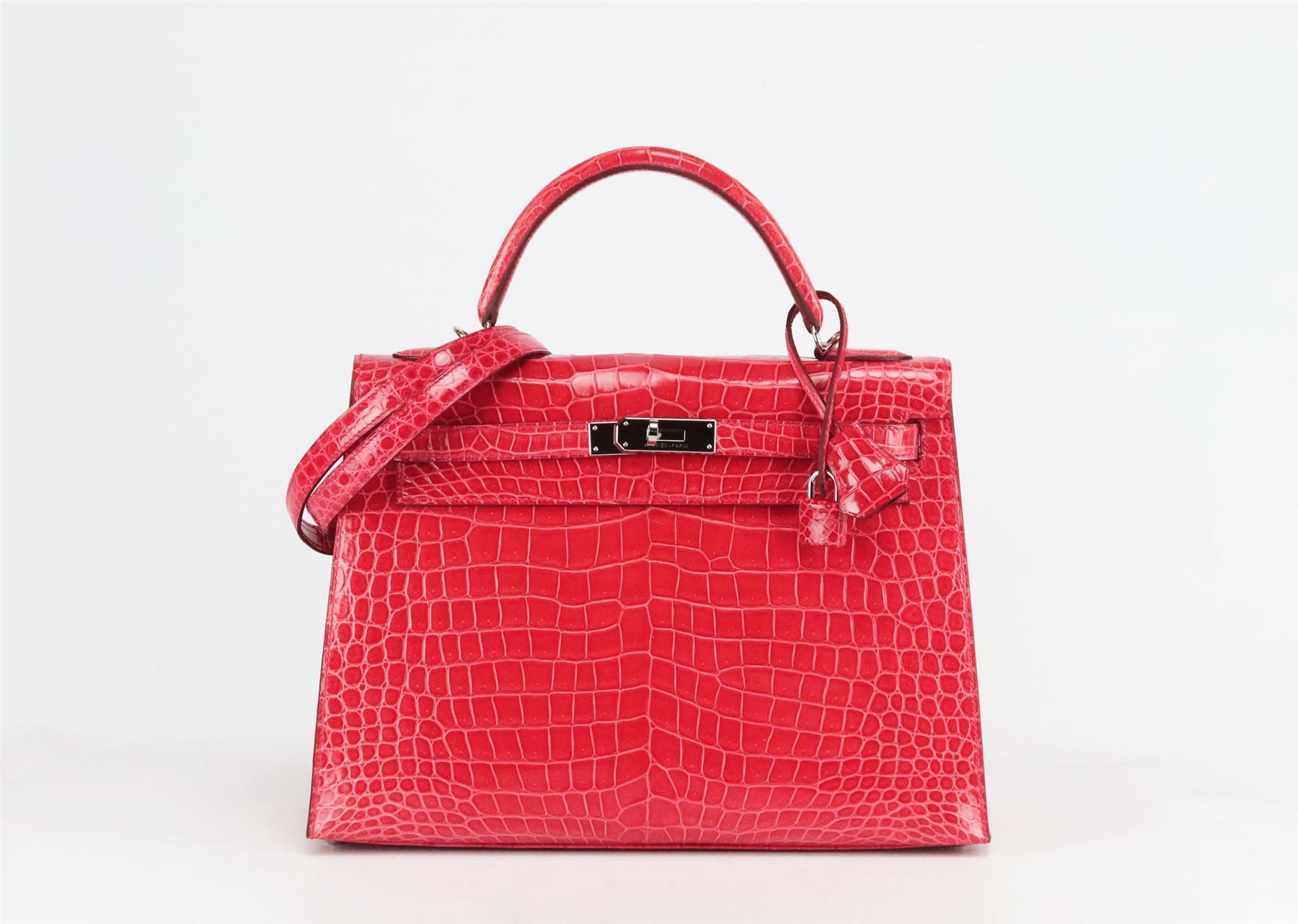 <ul>
<li>Made in France, this beautiful 2015 Hermès ‘Kelly Sellier’ 32cm handbag has been made from shiny Porosus Crocodile exterior in coral and matching leather interior, this piece is decorated with palladium hardware on the front and finished
