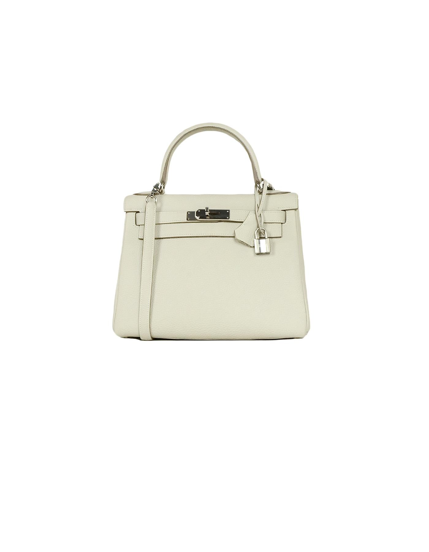 Hermes 2016 Craie Off-white Clemence 28cm Retourne Kelly Bag PHW w/ Strap

Made In: France
Year of Production: 2016
Color: Off-white
Hardware: Silvertone
Materials: Craie Leather
Lining: Leather
Closure/Opening: Leather draw strap closure with